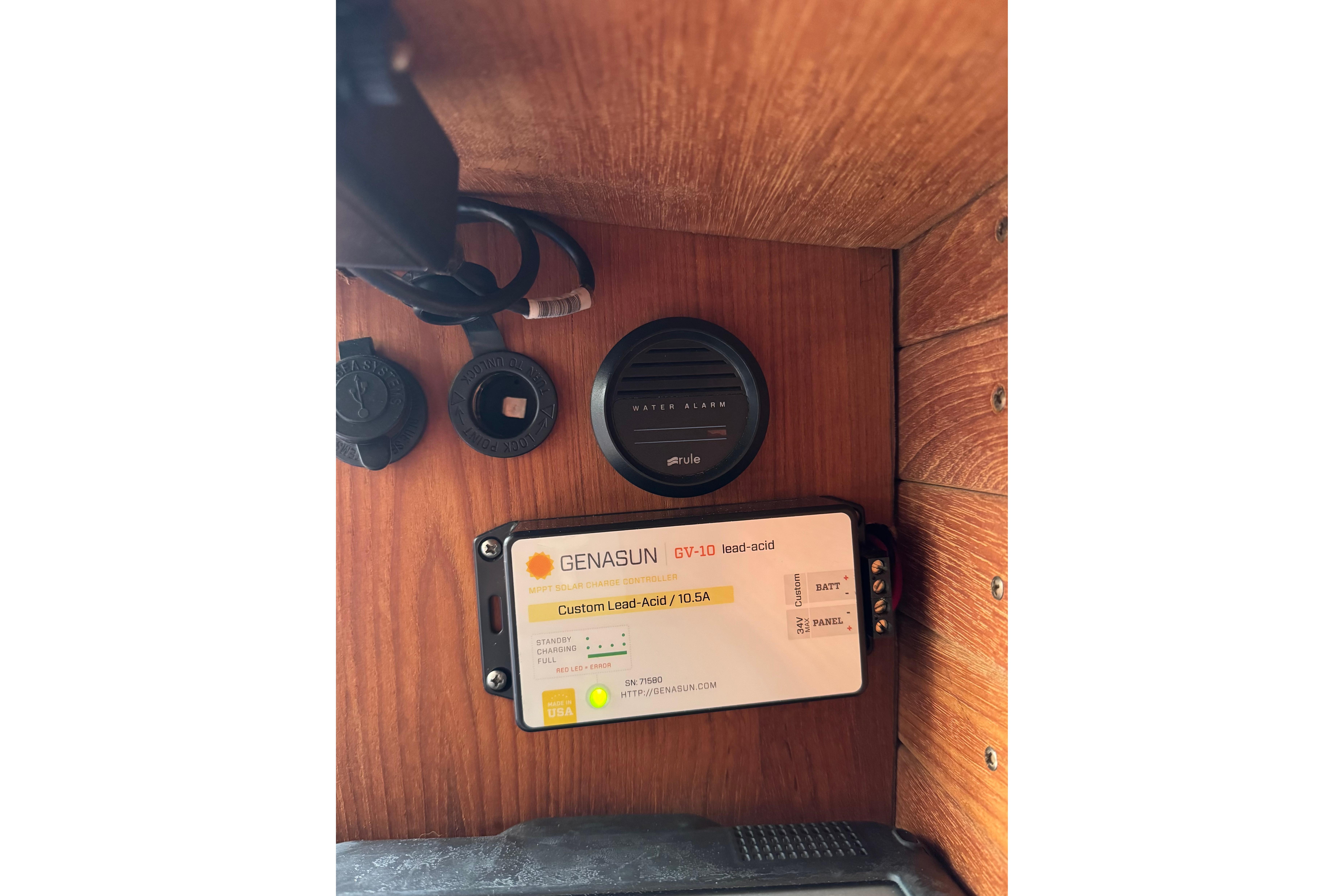 Genasun GV-10 solar charge controller in 2017 Alerion Express 28 sailboat interior.
