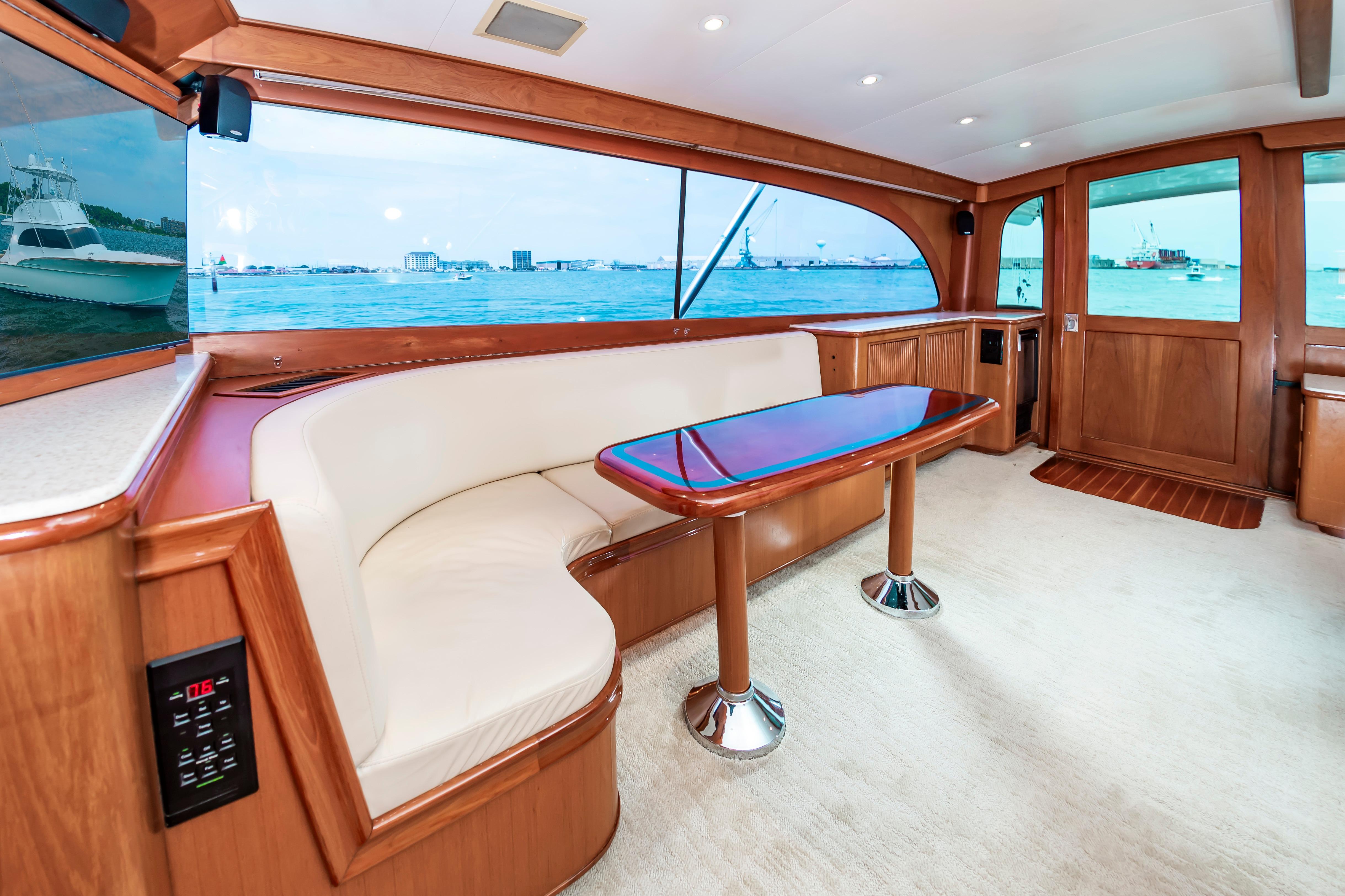 Luxurious interior of 1993 Custom Carolina Scarborough 56 Convertible yacht with ocean view.