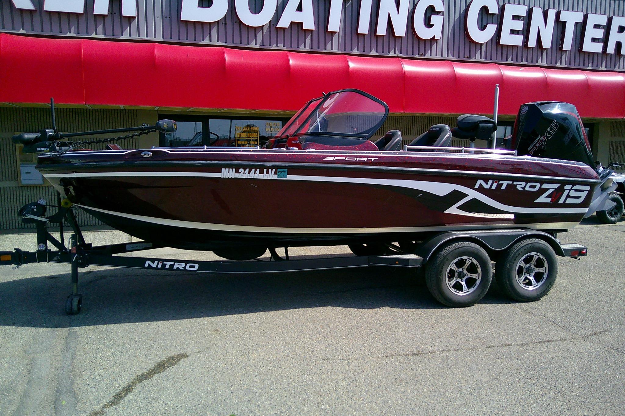 2019 Nitro ZV19 Sport boat on trailer at dealership.