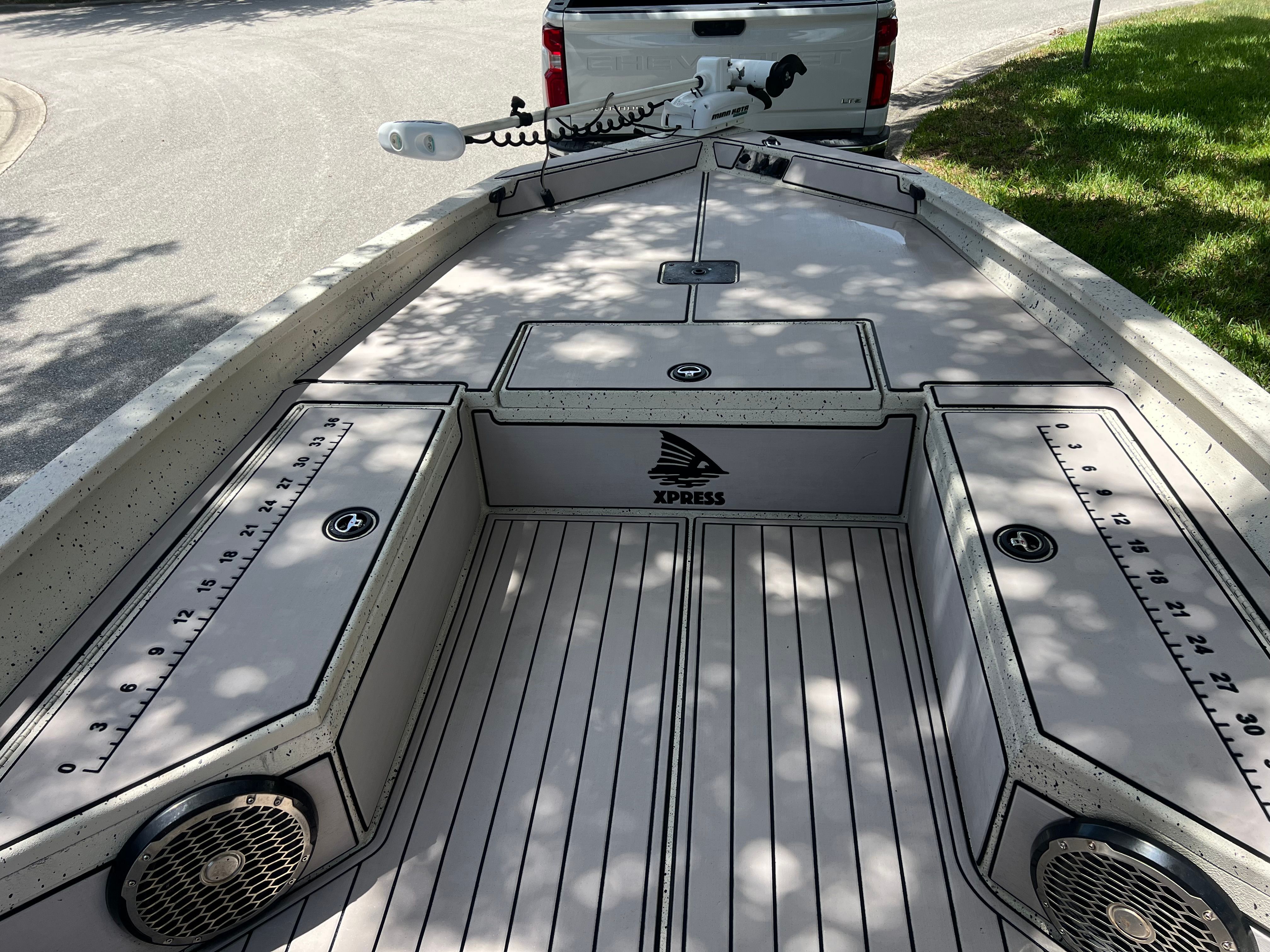2016 Xpress H24B Bay boat on a trailer.