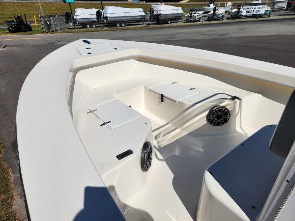 2023 May-Craft 208 CC boat interior with seating and storage compartments.