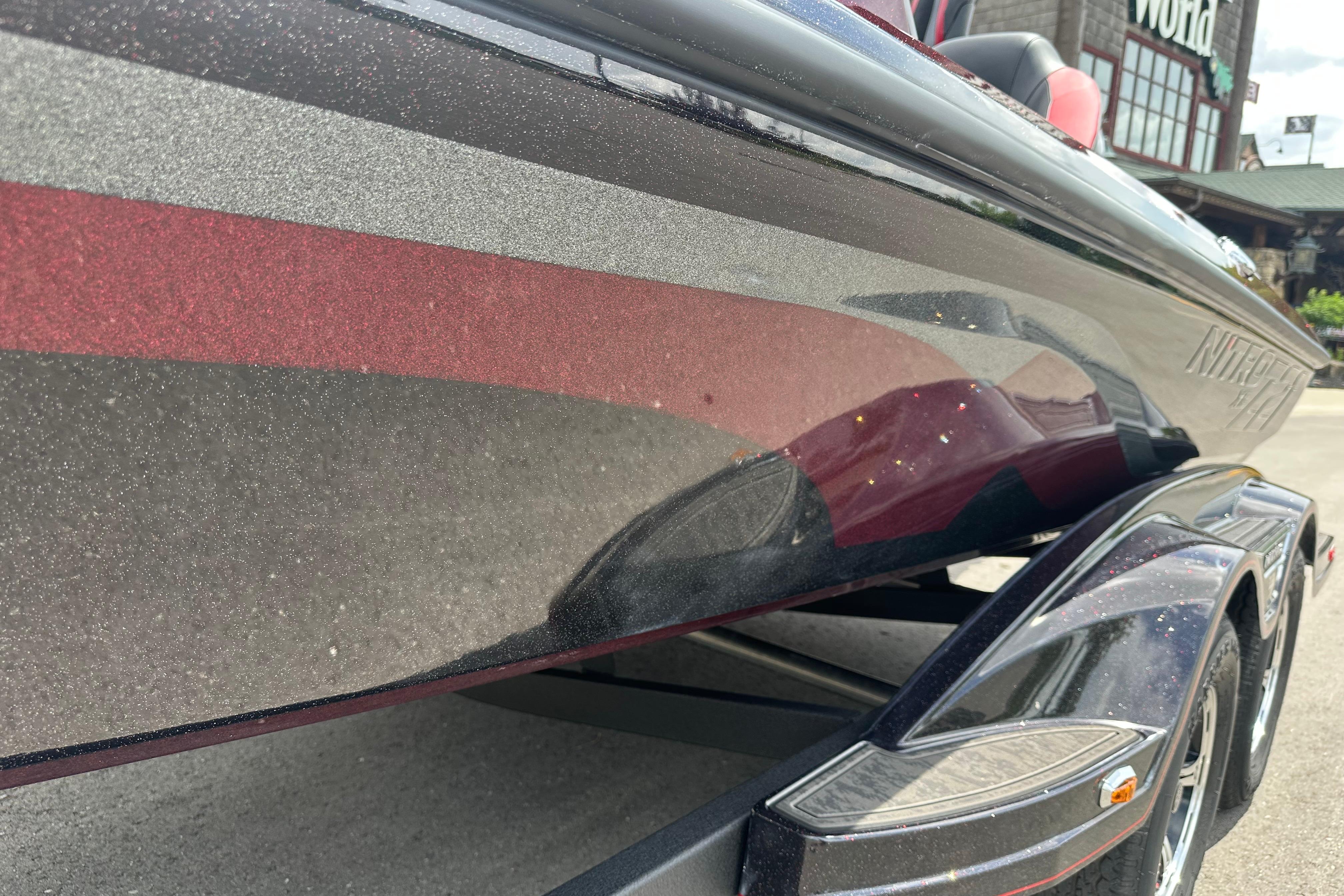 2026 Nitro Z21 XL boat with sleek, metallic finish and trailer.