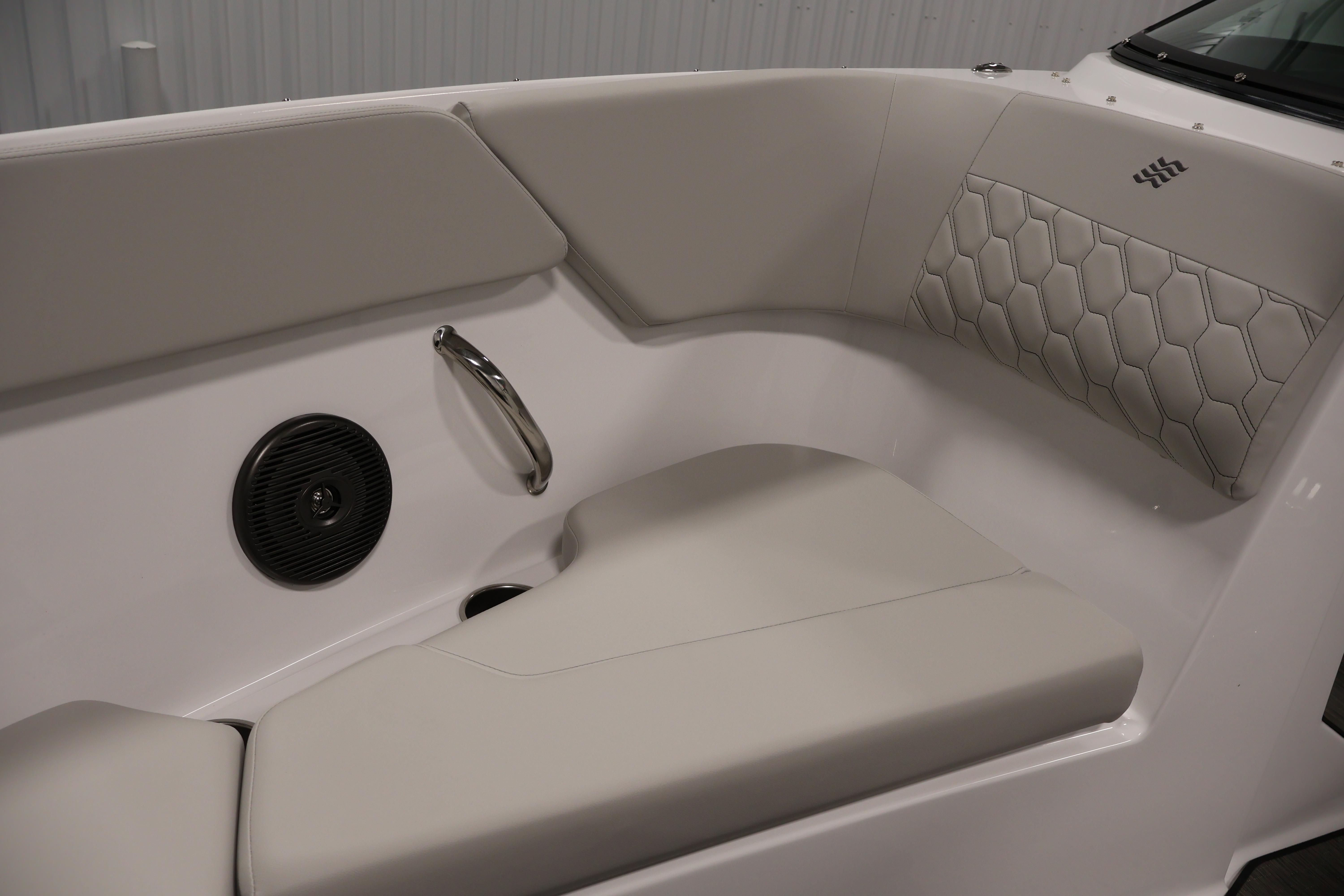 Interior seating of 2026 Four Winns H4 Freedom boat, featuring sleek design and comfortable upholstery.