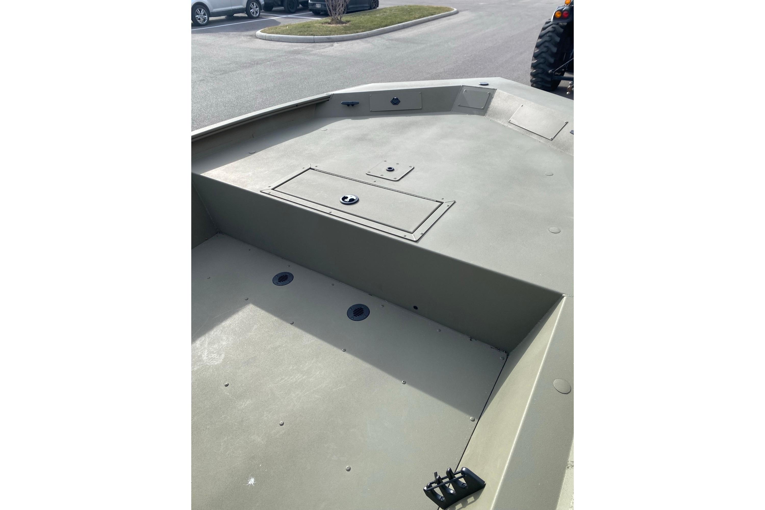 2026 Tracker Grizzly 1860 CC boat deck, spacious and durable design.