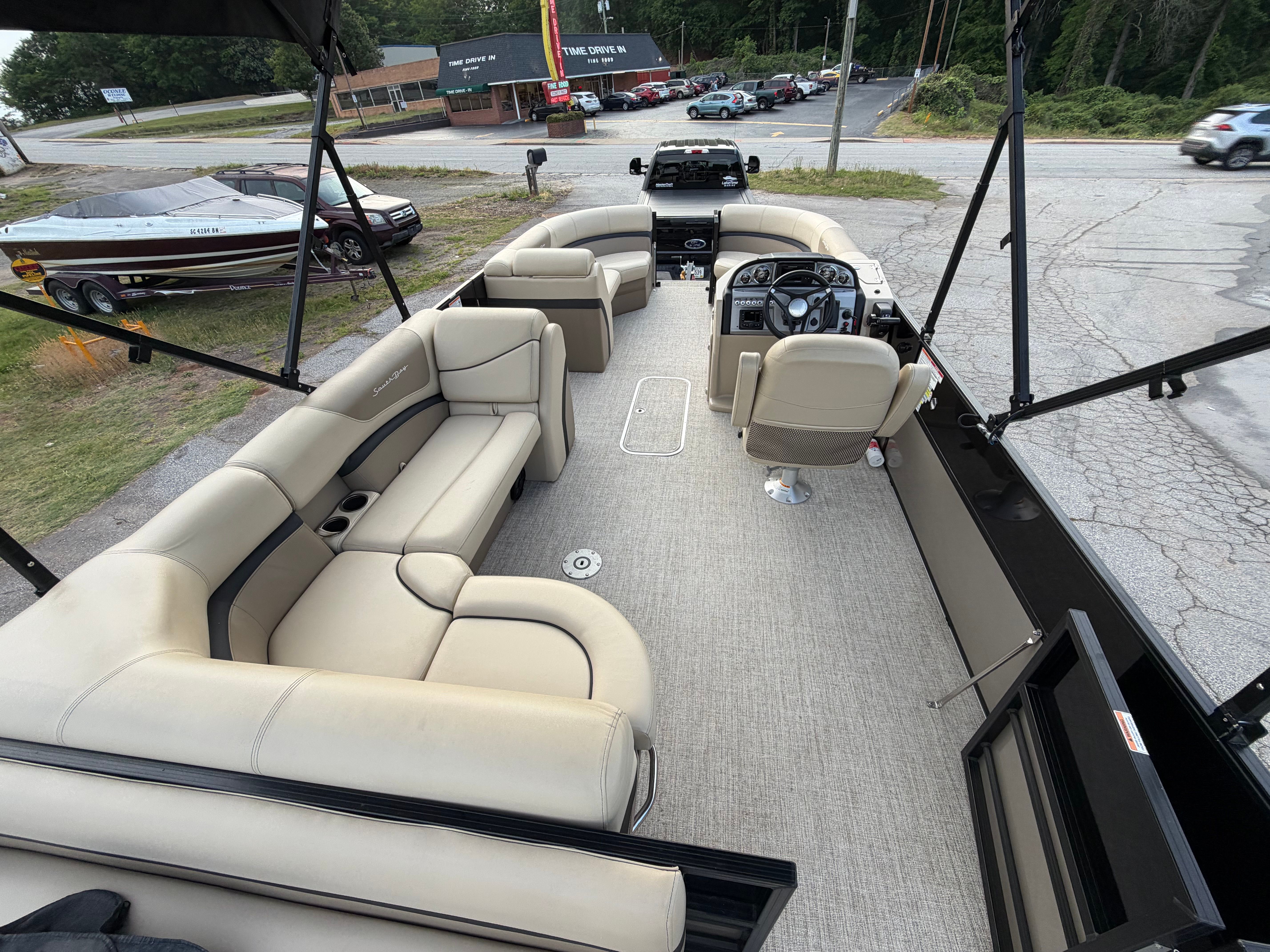 Interior view of a 2023 South Bay S222 CR2 pontoon boat.