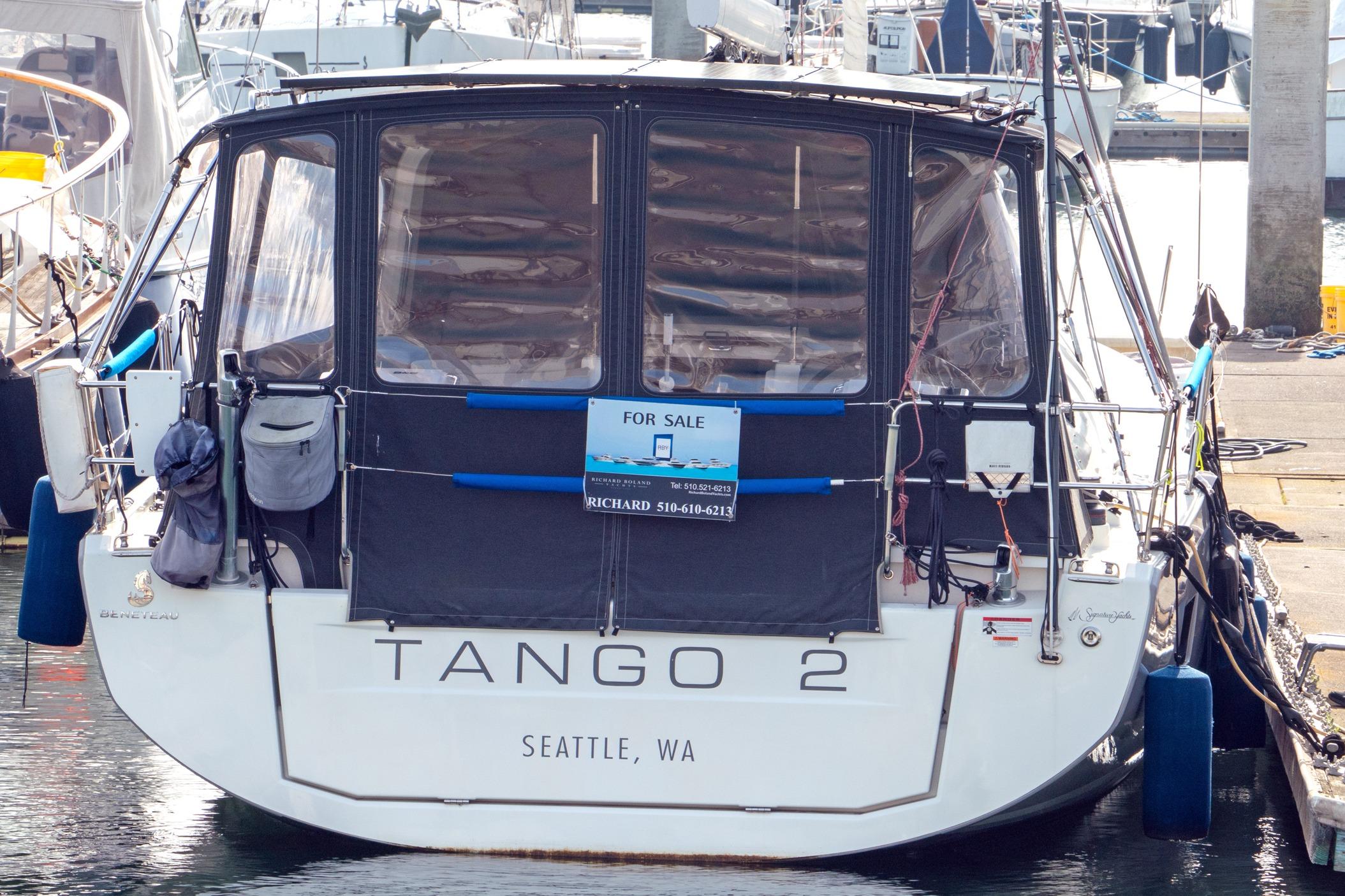 Beneteau Oceanis 461 sailboat, 2022 model, docked in Seattle, WA, with "For Sale" sign.