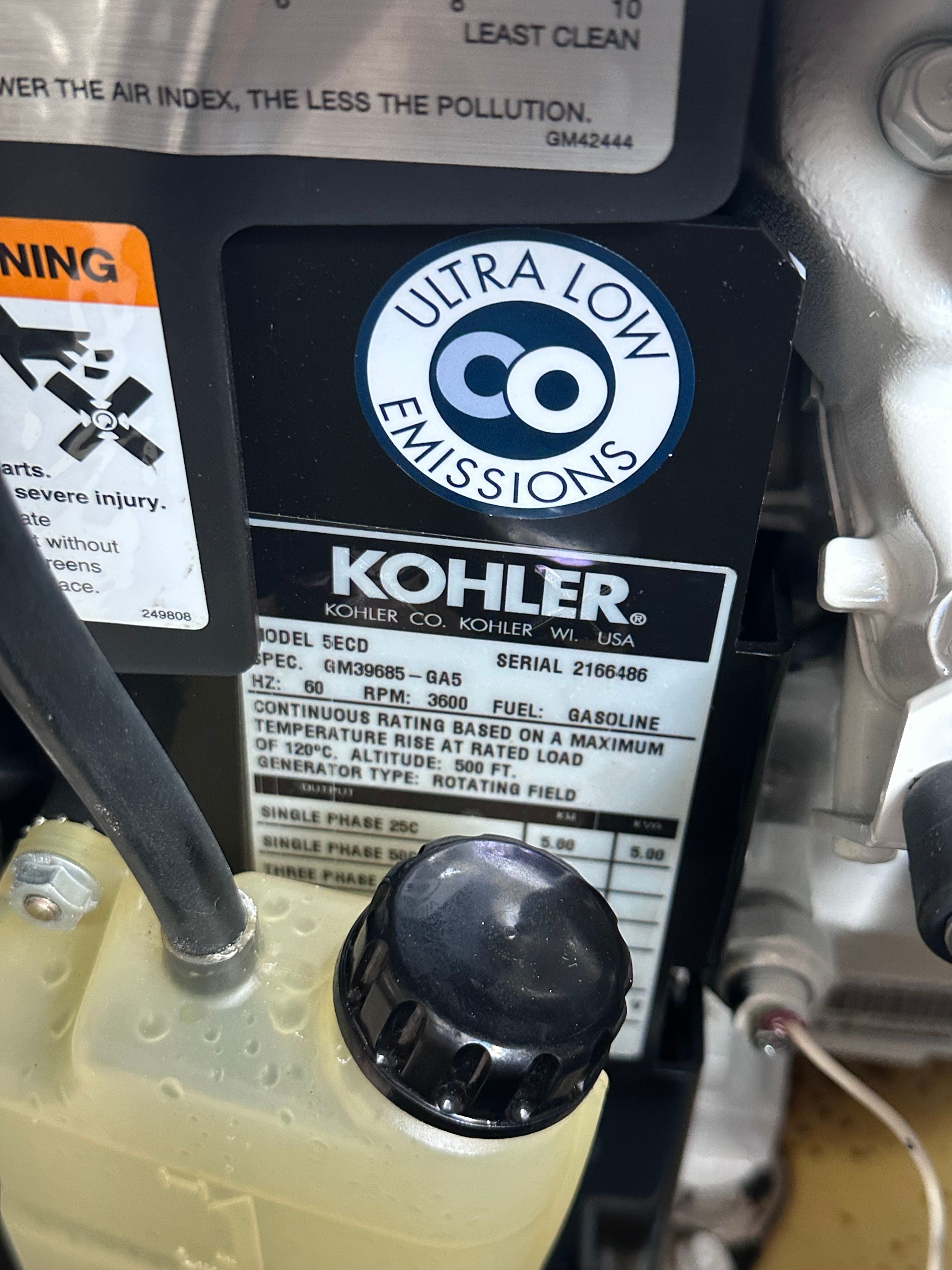 Kohler engine with Ultra Low Emissions sticker, part of a 2008 Chaparral Signature 330.