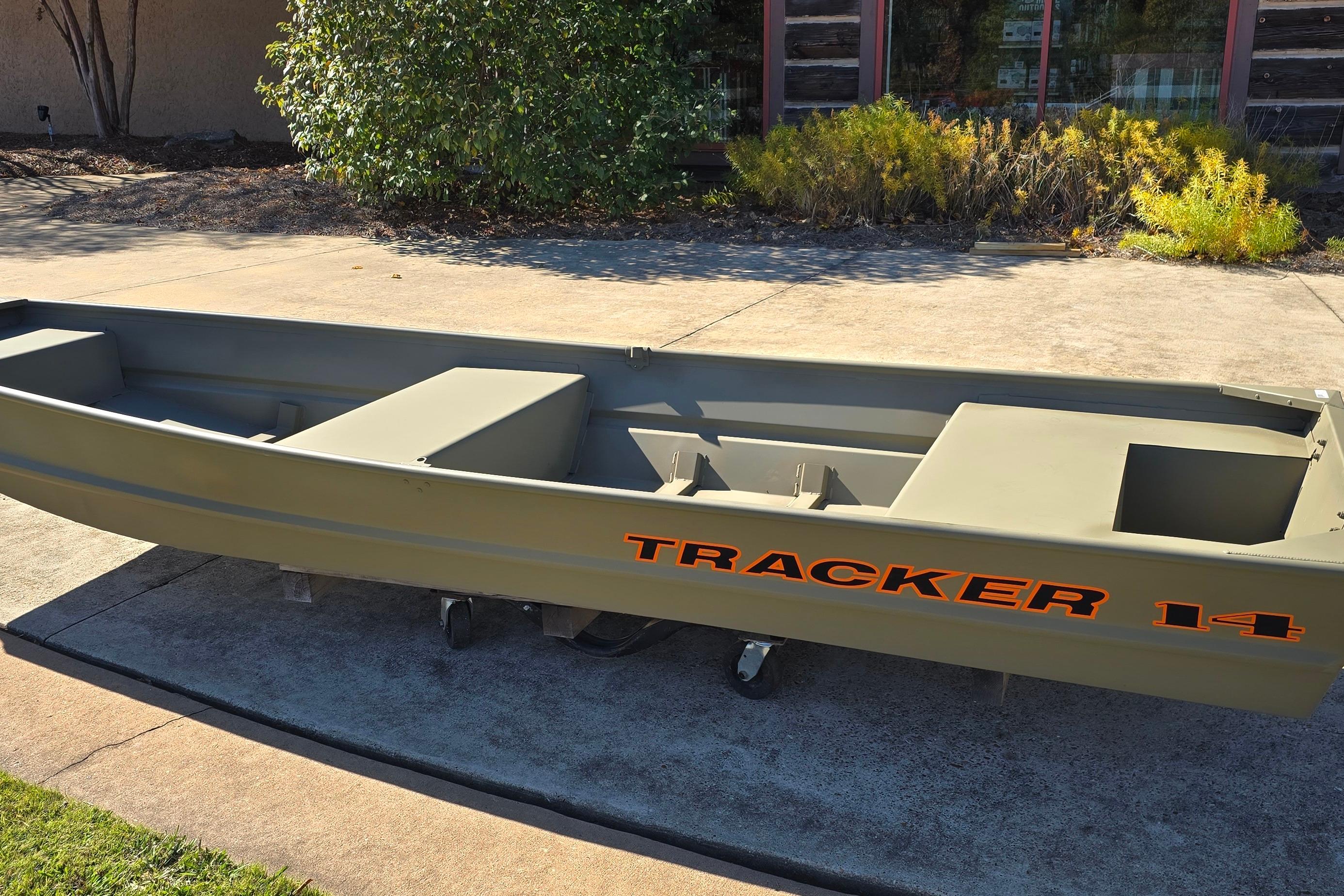 2026 Tracker Grizzly 14 Jon boat on display outdoors.