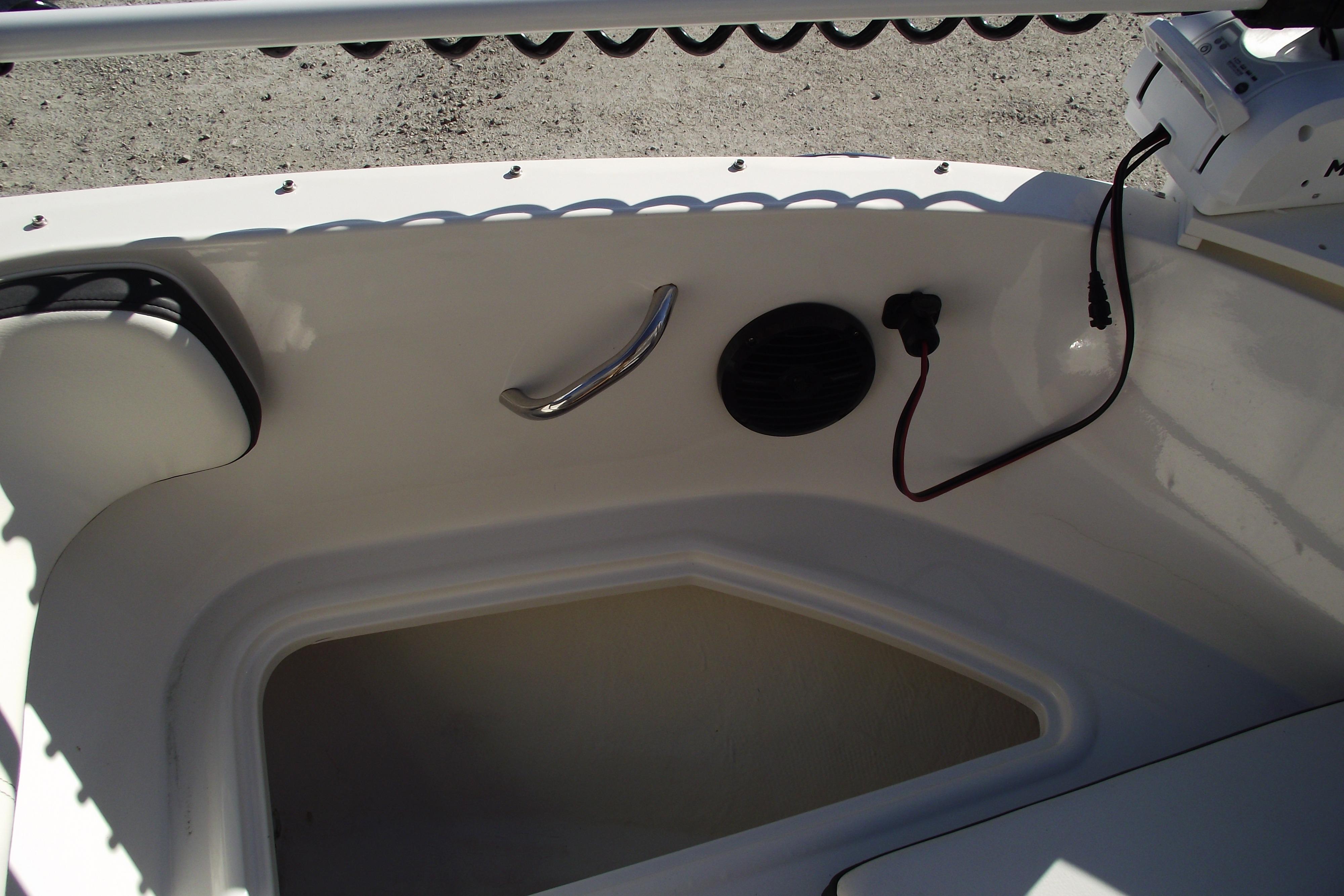 2022 Bayliner VR4 Bowrider OB interior detail with storage compartment and wiring.