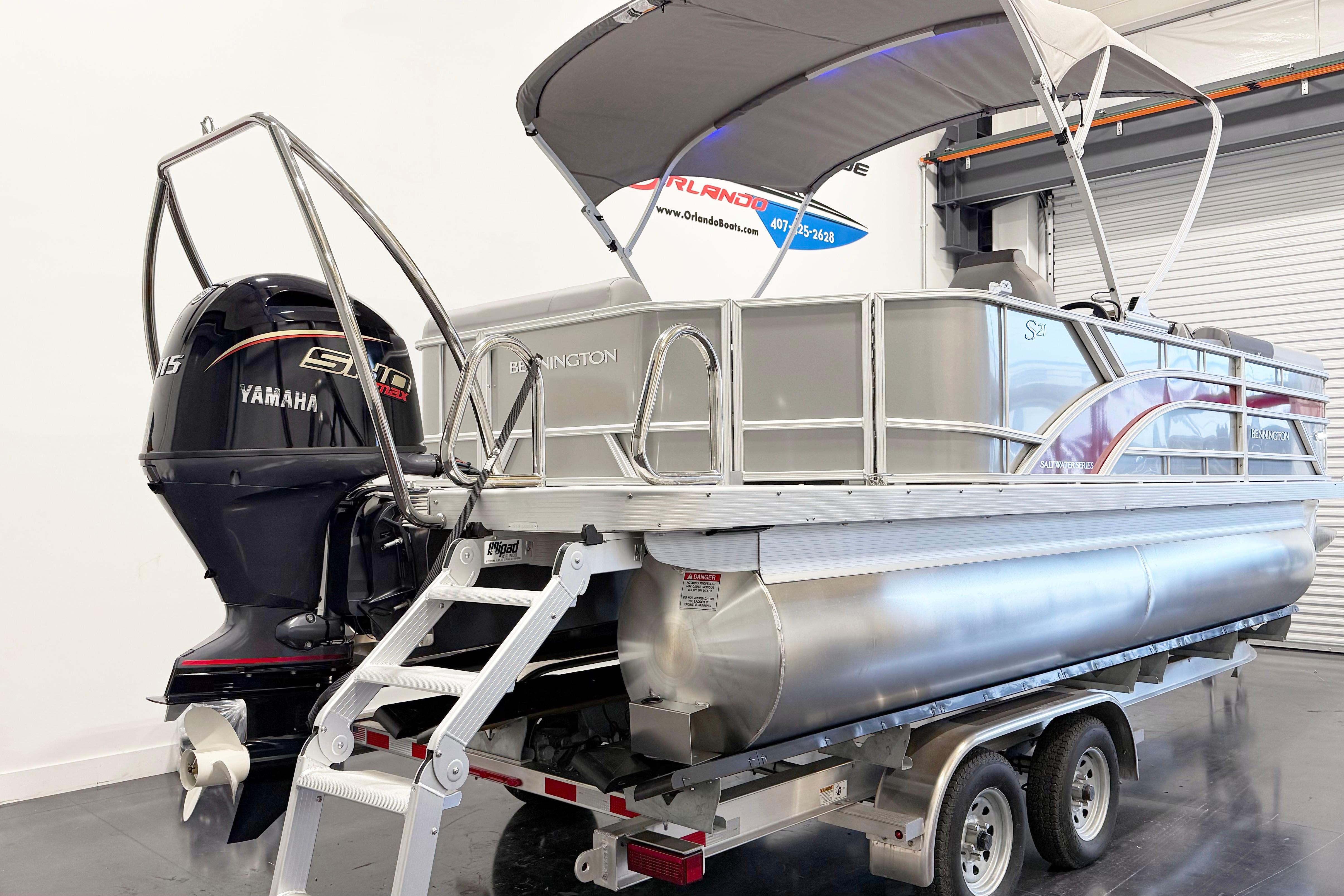 2025 Bennington 21S Cruise pontoon boat with Yamaha engine on trailer.