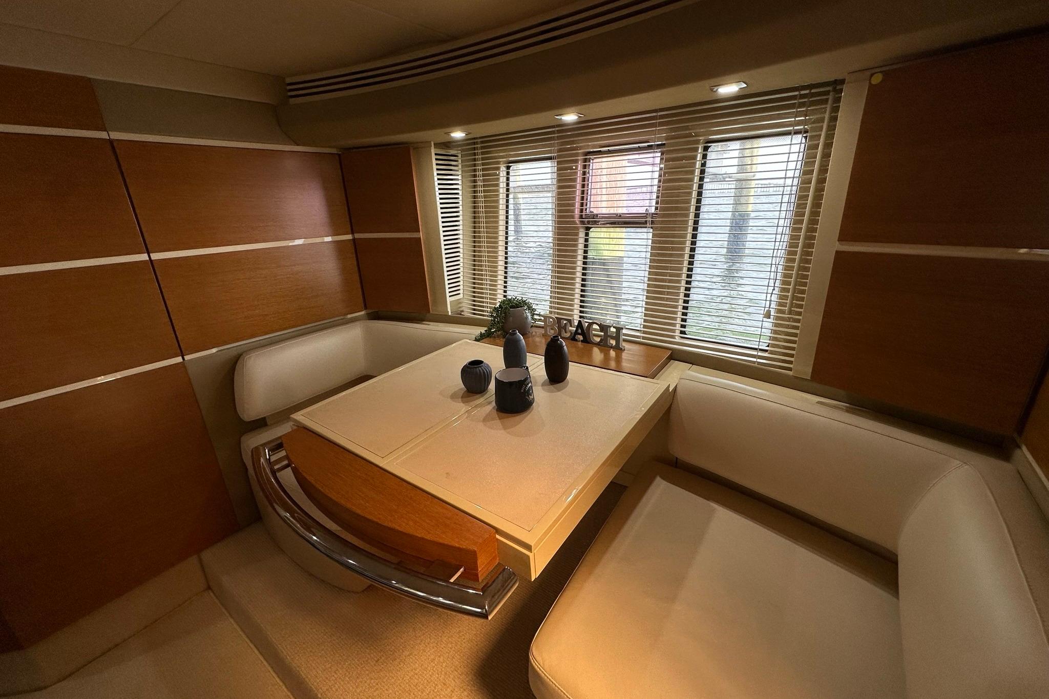 Luxurious interior of 2013 Azimut Fly 53 yacht with elegant dining area.