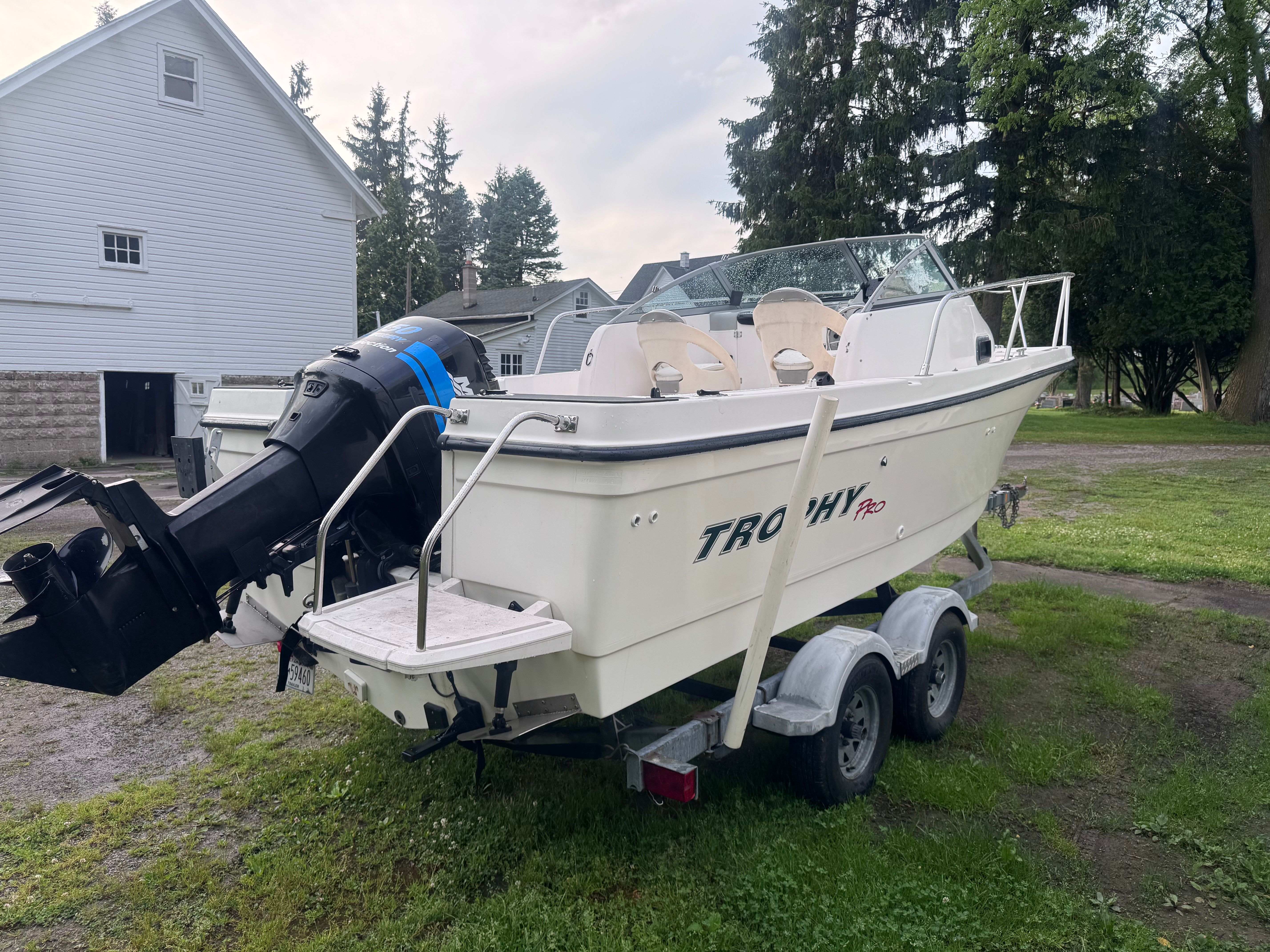 2005 Bayliner Trophy boat parked on trailer outdoors.
