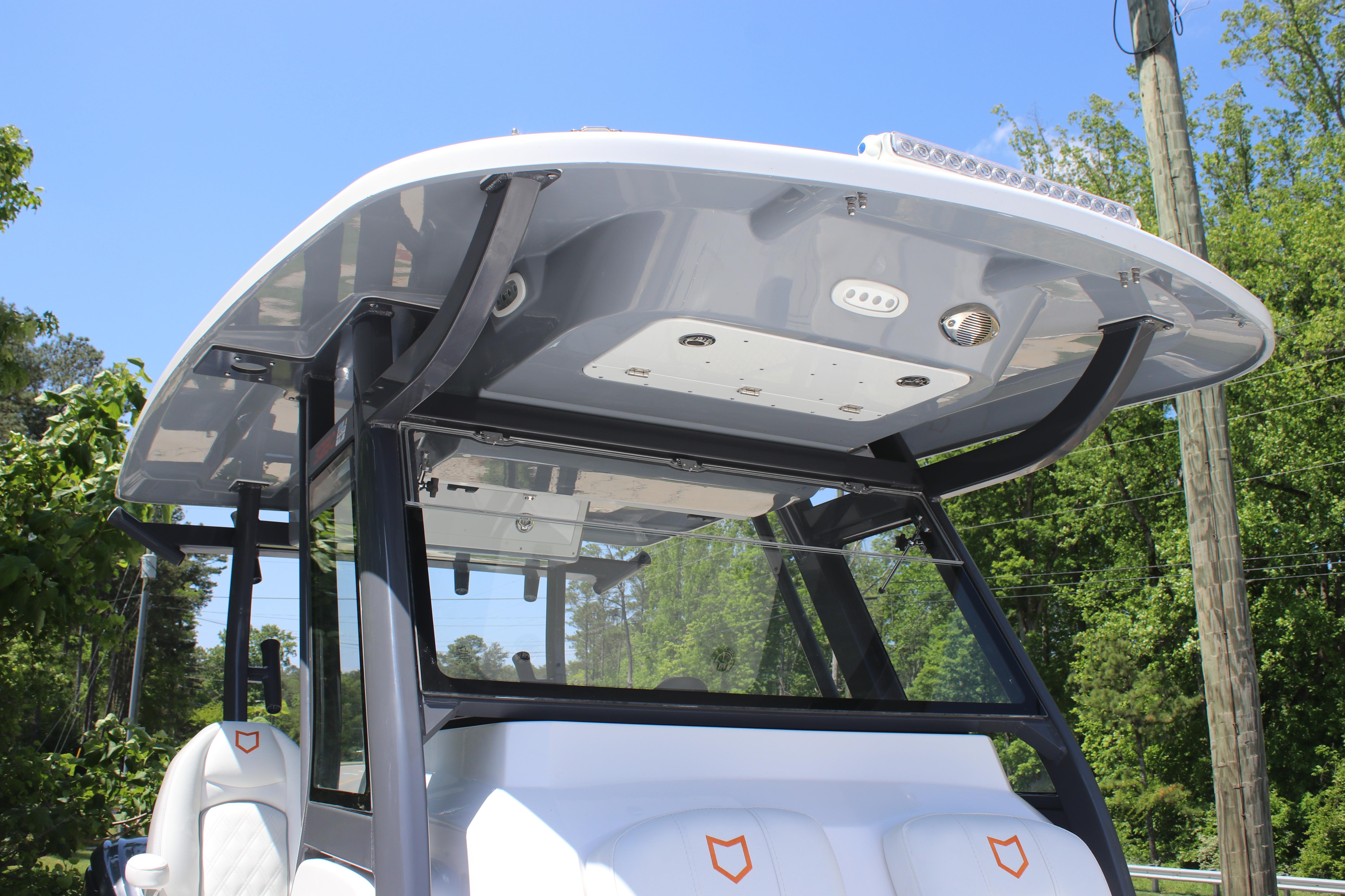 2025 Sea Fox 328 Commander boat with sleek T-top design and modern features.