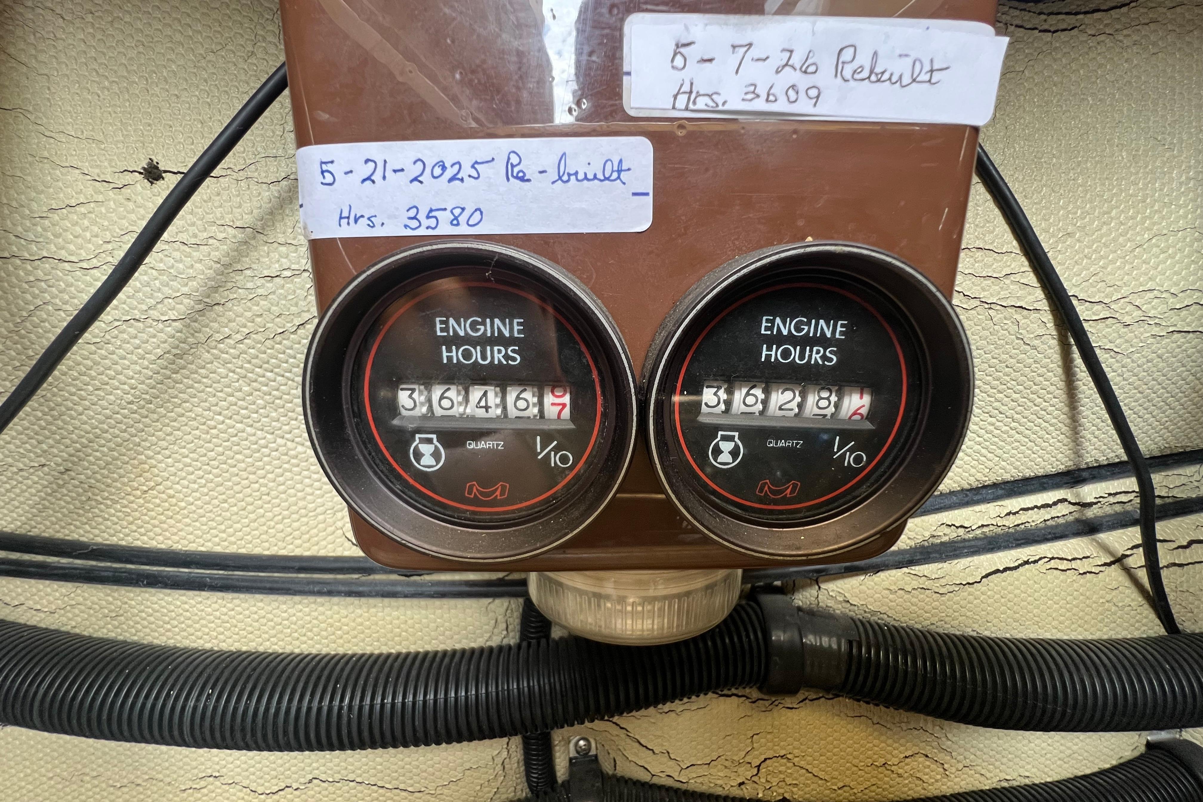 Engine hour meters on a 1985 Tiara 36 OPEN boat, showing readings and notes.