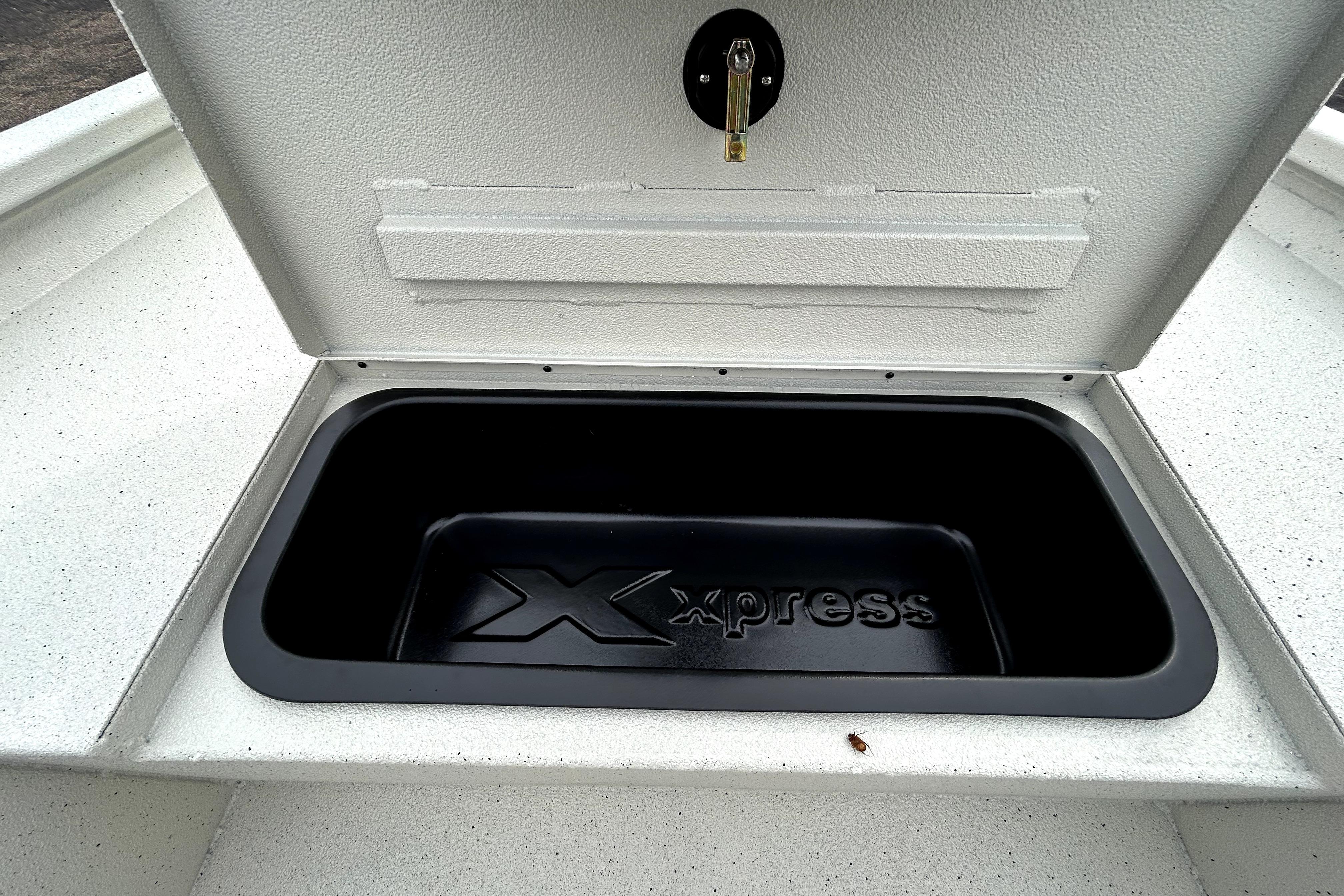 Open storage compartment in 2026 Xpress H20B Bay boat.