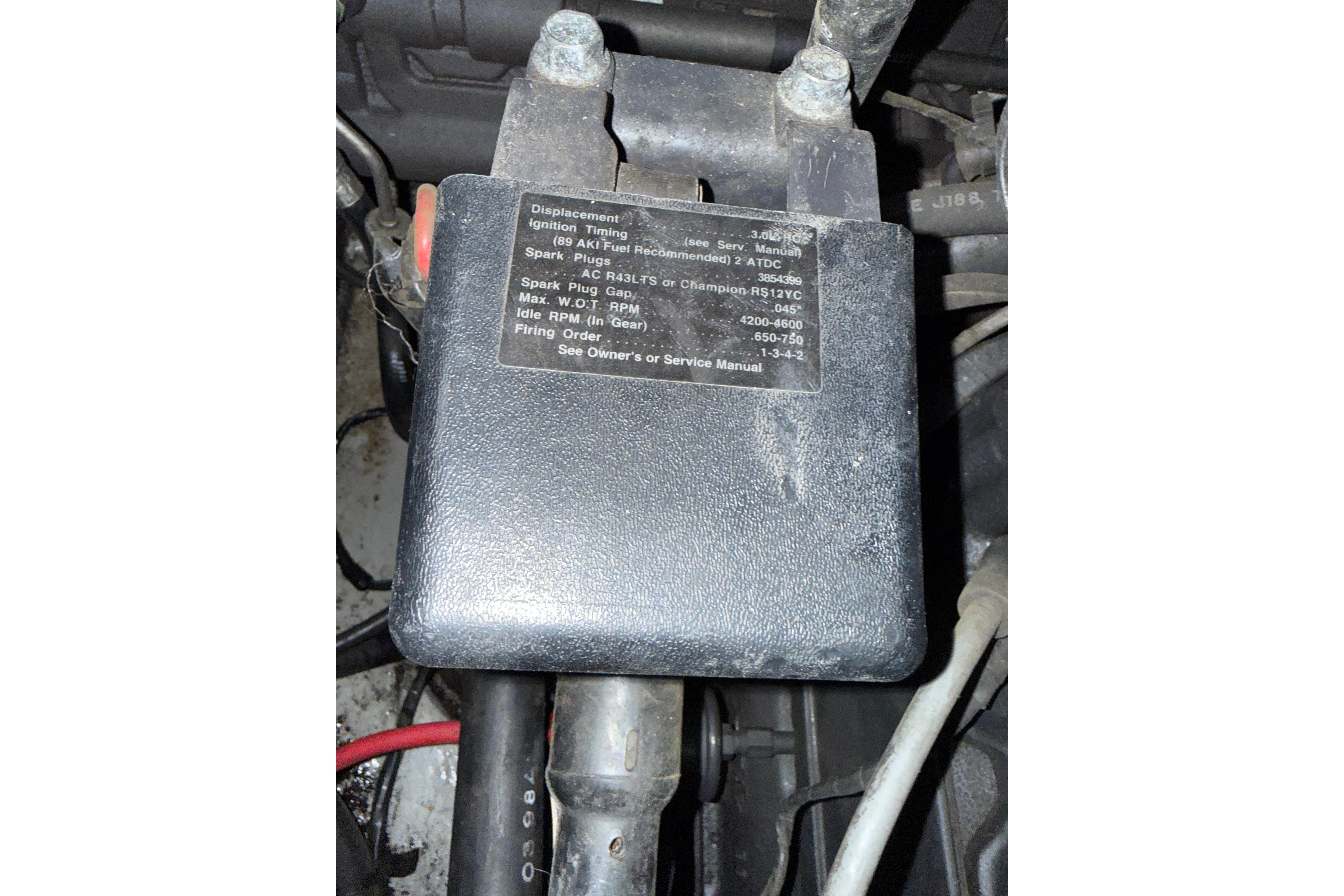 Engine component with specifications label for 1999 Four Winns 170 Horizon LE boat.