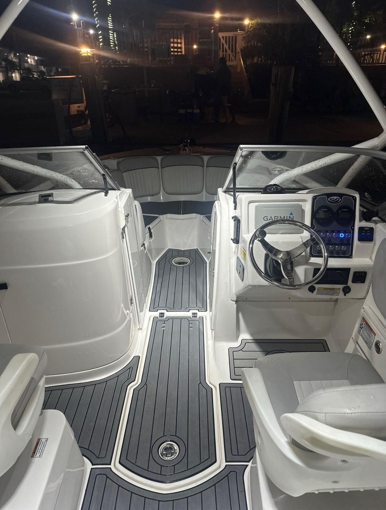 Interior view of a 2021 Sea Fox 226 Traveler boat at night.