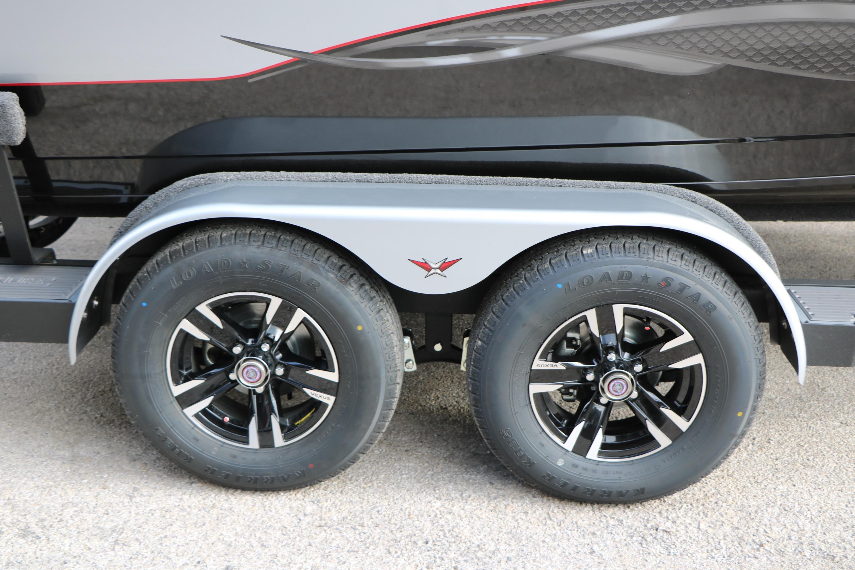 2026 Vexus ADX 190 trailer wheels with sleek black rims and Load Star tires.