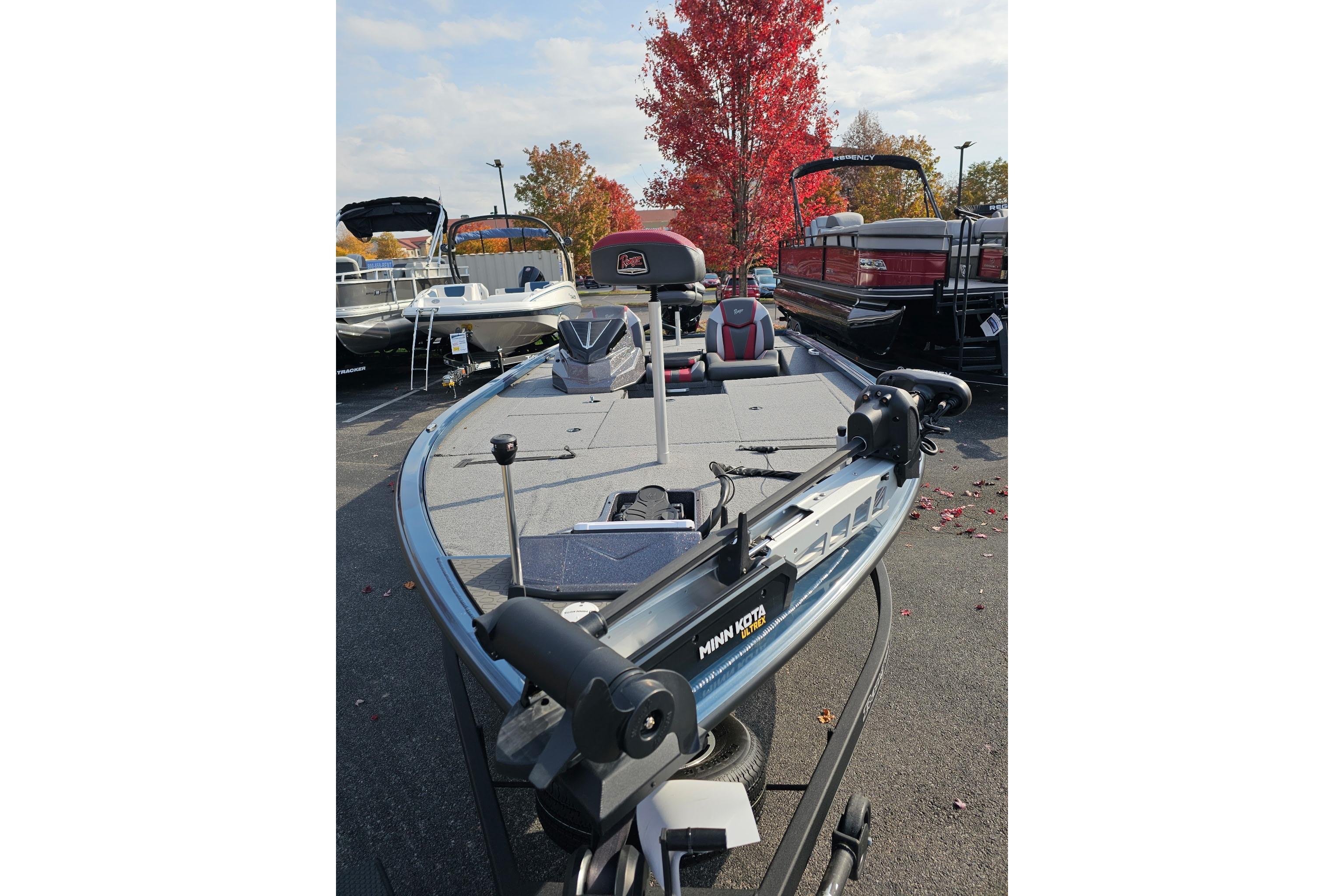 2025 Ranger ALPHA 208 boat with Minn Kota motor, displayed outdoors in autumn setting.