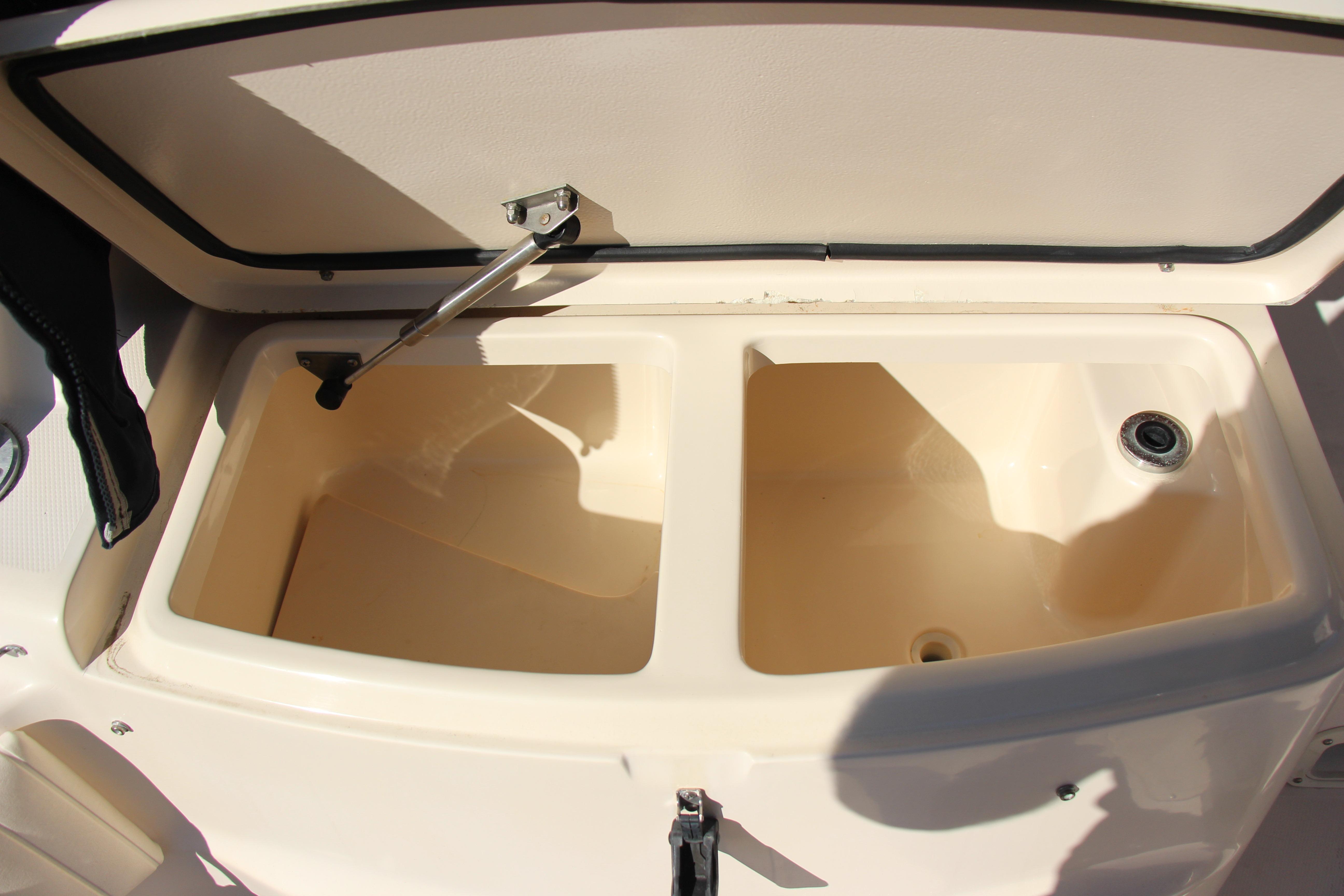 2005 Grady-White Express 330 boat storage compartments, open and empty.