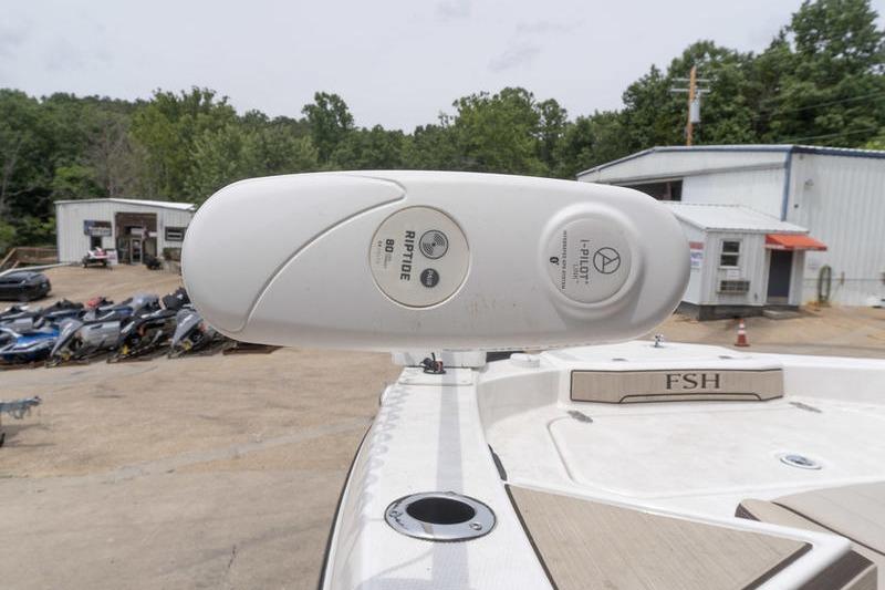 2023 Yamaha Boats 195 FSH Sport with Riptide trolling motor, outdoor setting.
