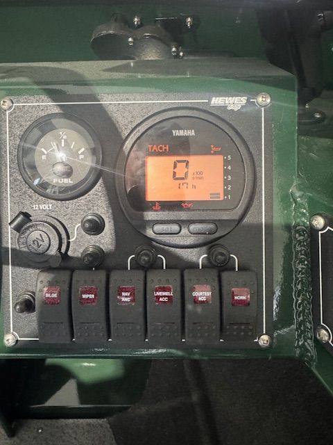 Dashboard of a 2023 Hewescraft 180 Sportsman boat with Yamaha tachometer.