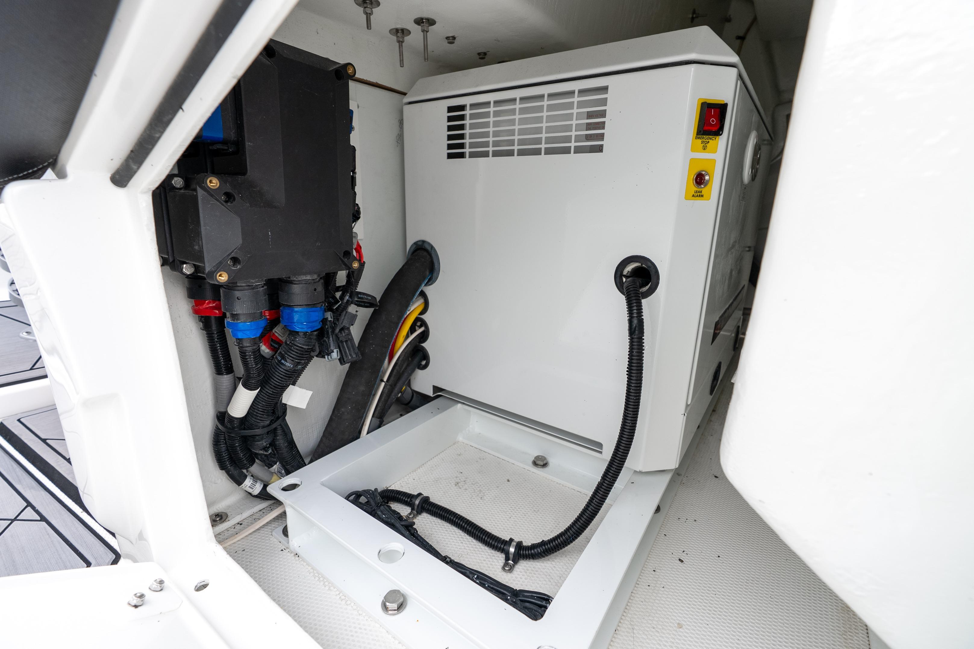 2024 Nor-Tech 452 Super Fish engine compartment with electrical components and wiring.