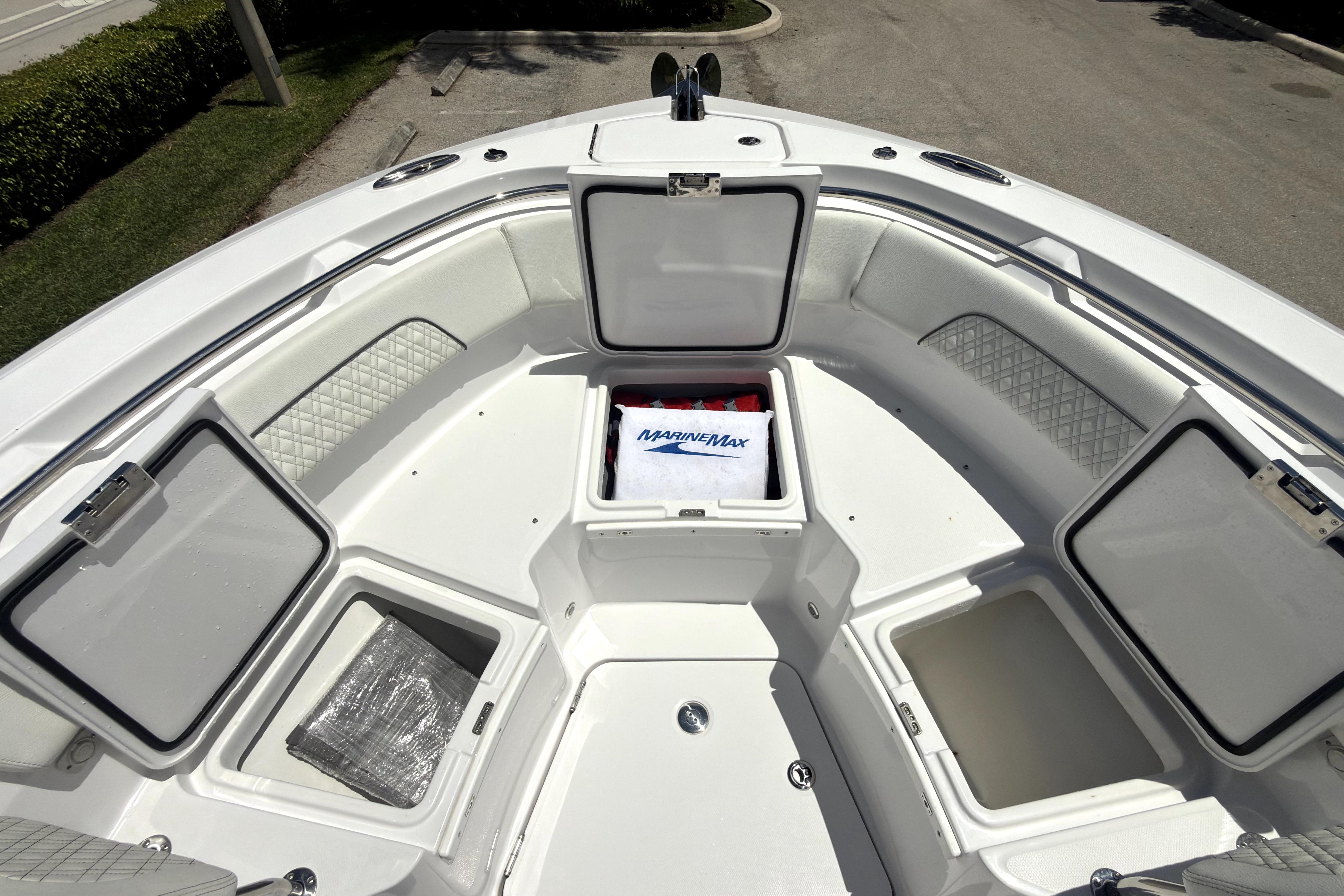 2023 Bertram 28 CC boat interior with open storage compartments.