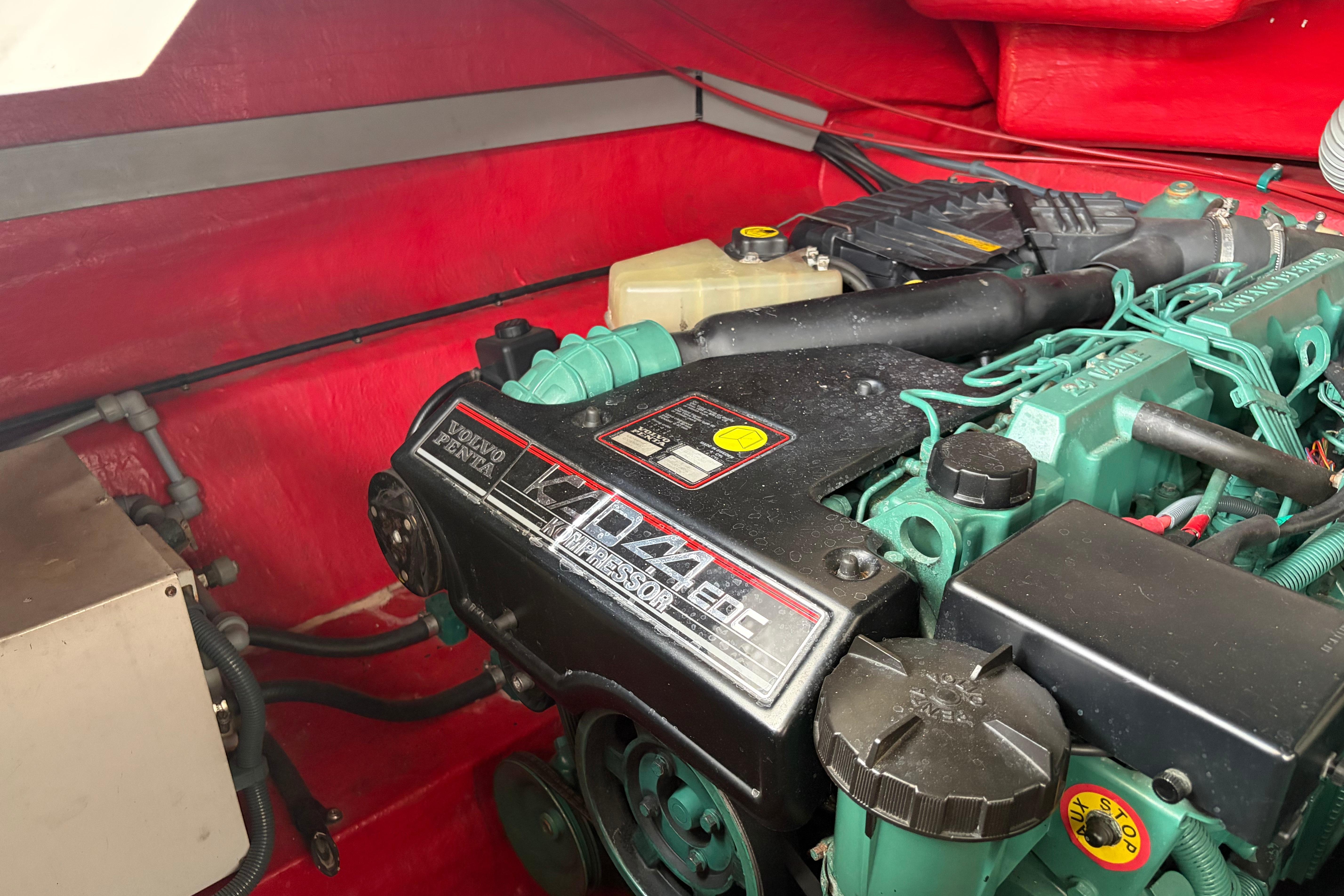 Volvo Penta engine in a 2000 Sunseeker Superhawk 34, showcasing detailed mechanical components.