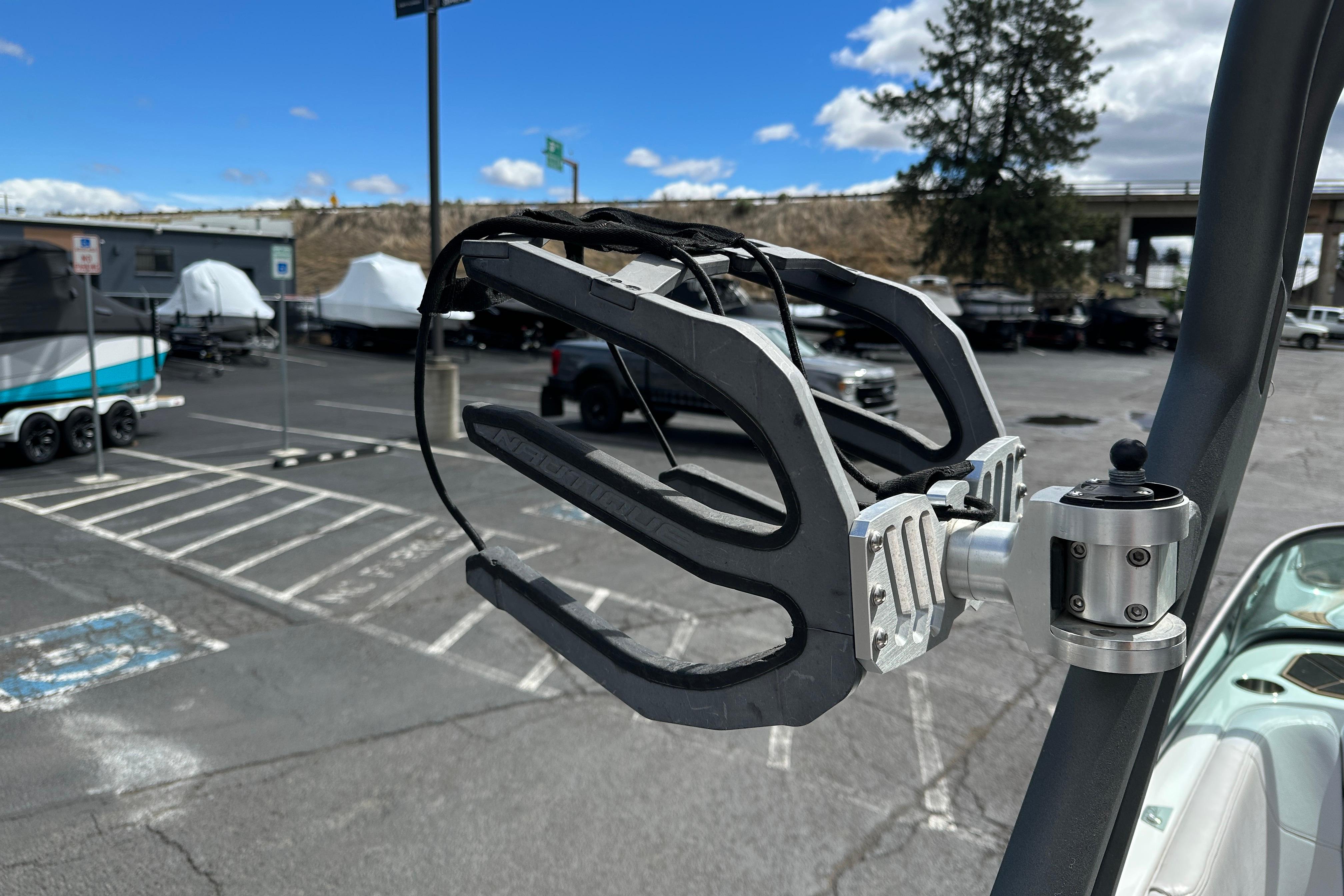 Wakeboard rack on 2017 Nautique Super Air Nautique GS20 in parking lot.