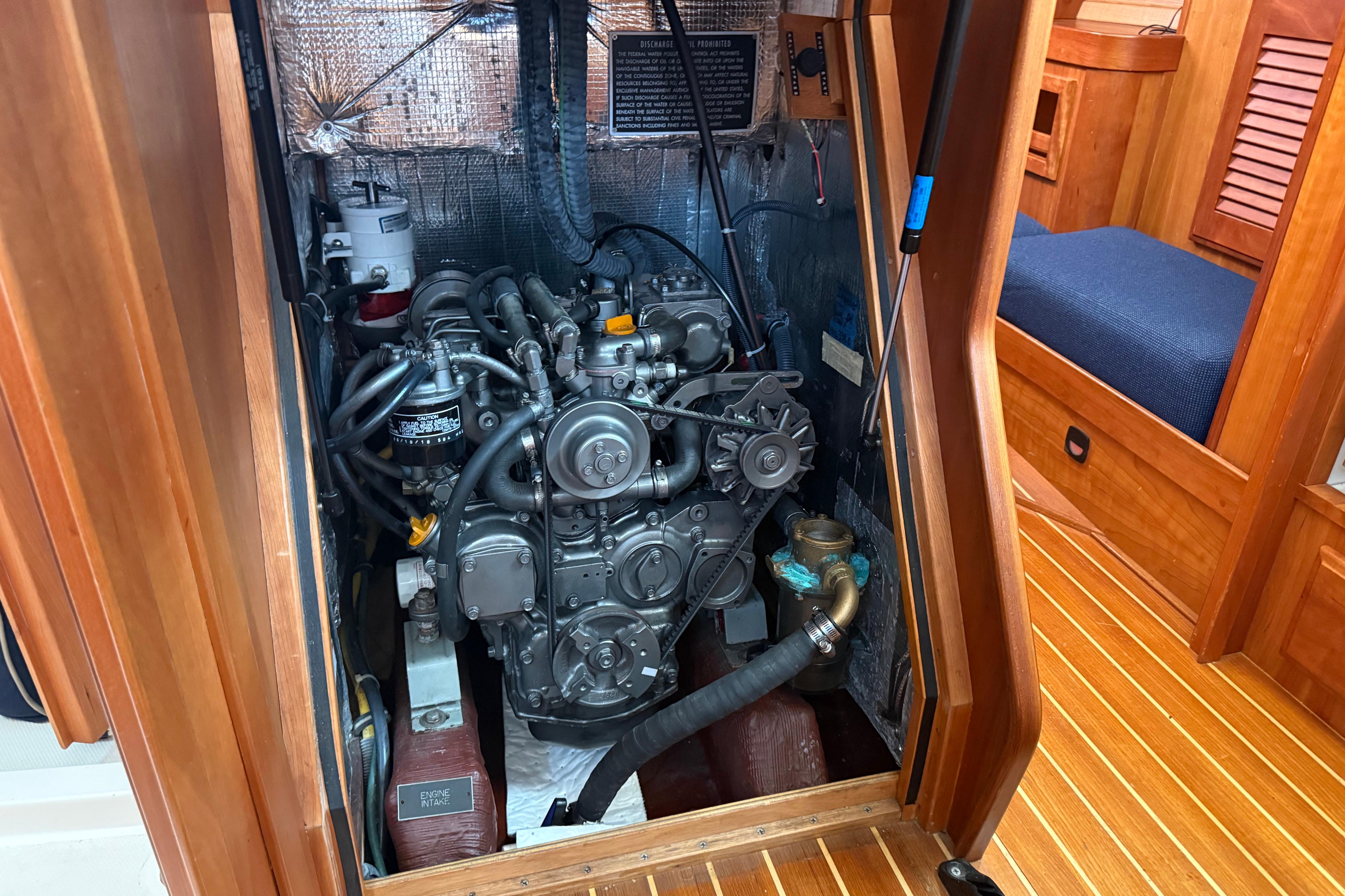 Engine compartment of a 2004 Sabre 386 sailboat, showcasing detailed mechanical components.