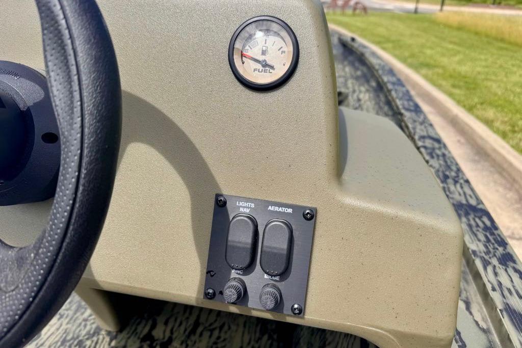 2026 Tracker Grizzly 1754 SC dashboard with fuel gauge and control switches.