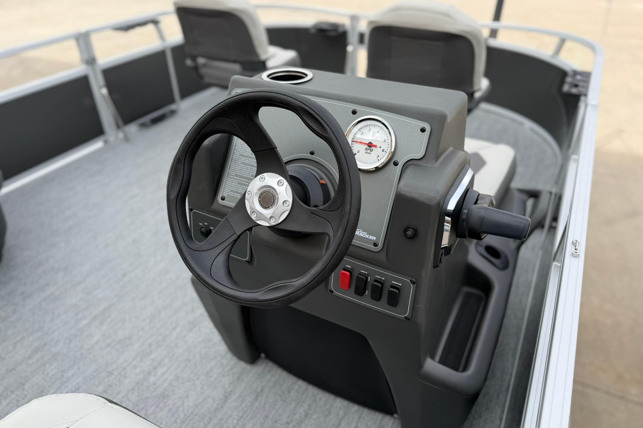 2026 Sun Tracker Bass Buggy 16 XL Select steering console with gauges and controls.