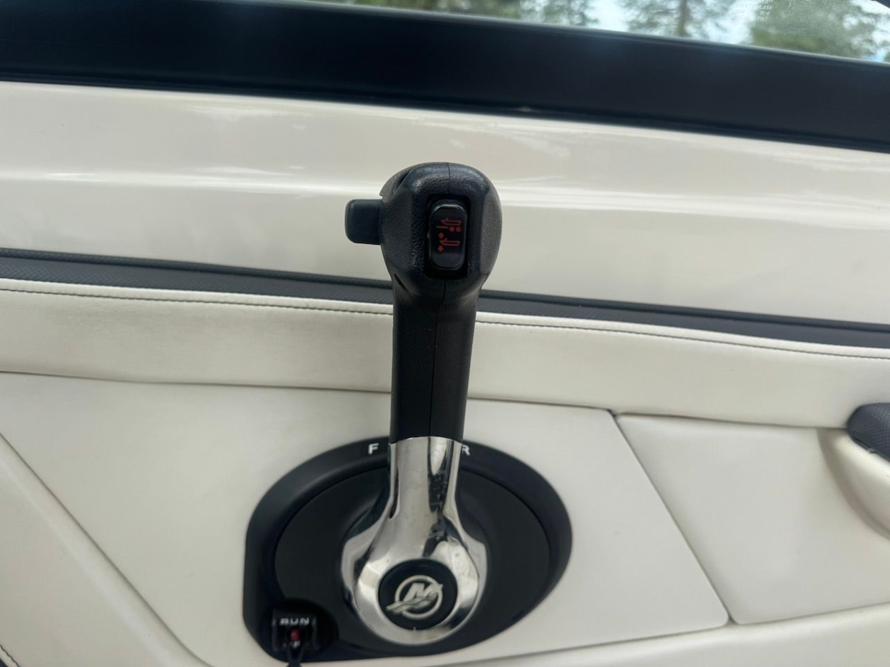 Close-up of the throttle lever on a 2016 Sea Ray SPX 190 Outboard.