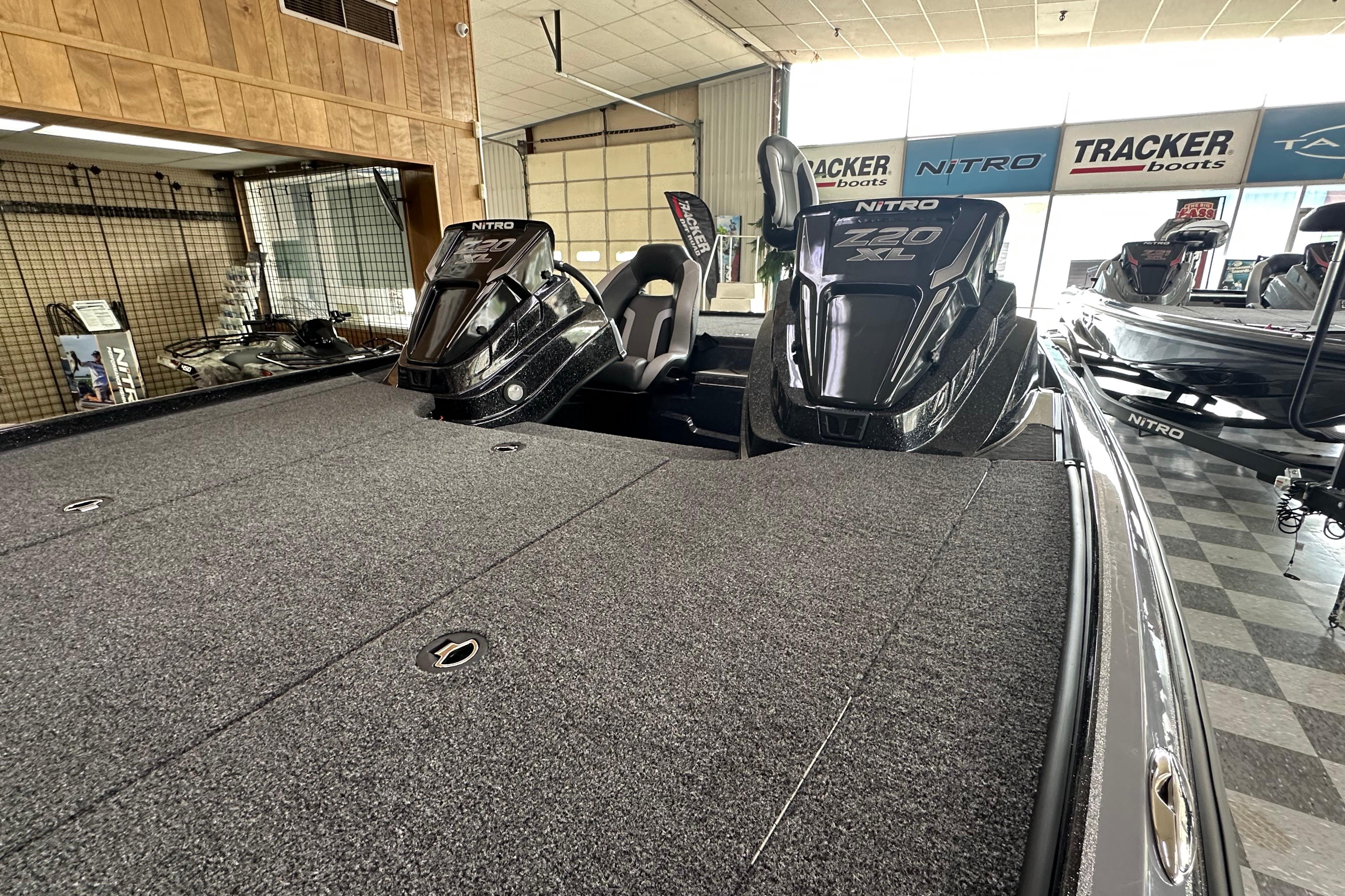 2025 Nitro Z20 XL Pro boat displayed in showroom with Tracker Boats signage.