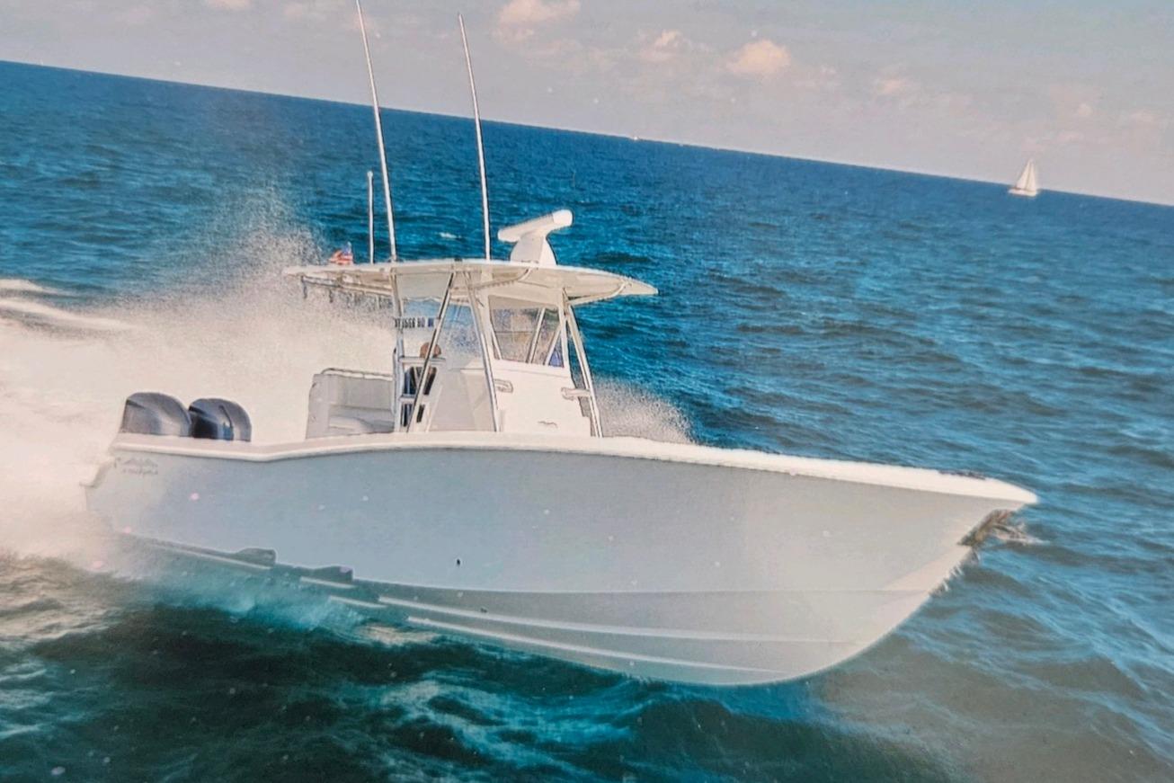 2017 Invincible 33 Open Fisherman speeding on ocean waters.