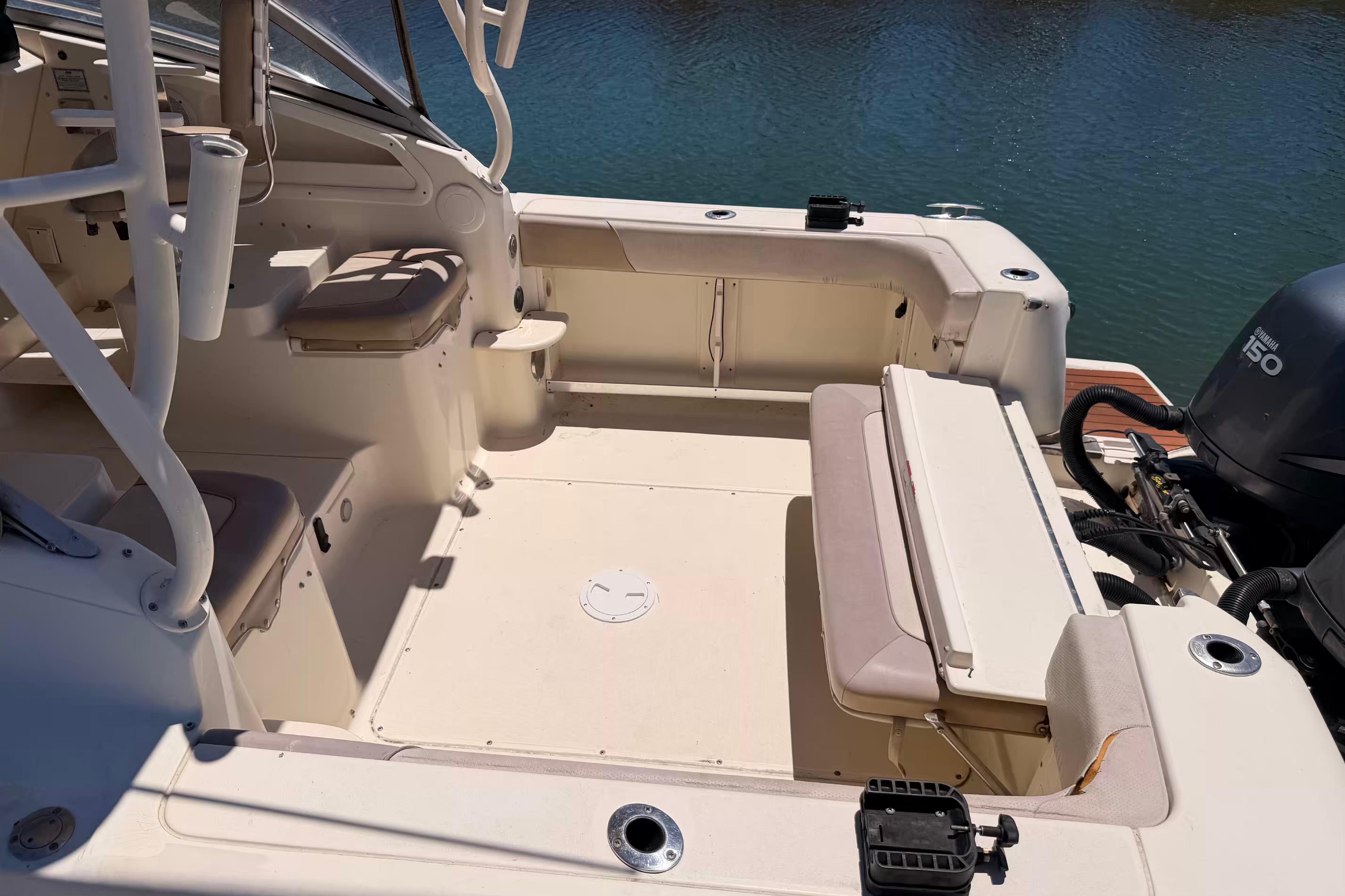 2007 Scout 262 Abaco boat interior with seating and Yamaha 150 engine.
