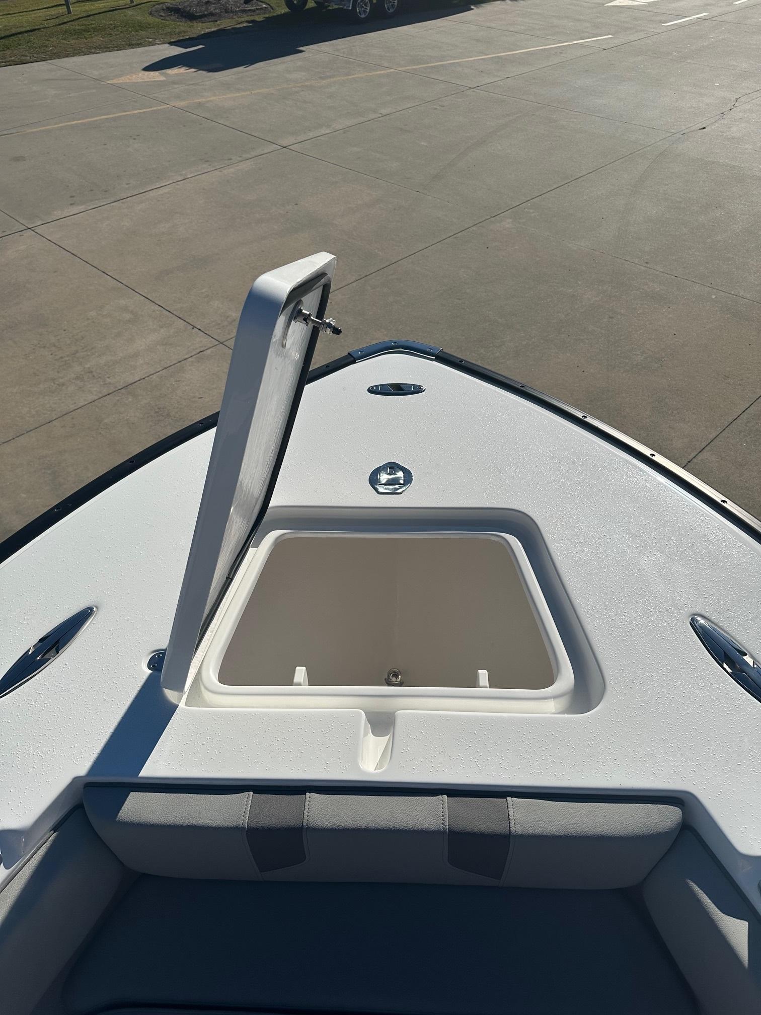 2025 Cape Horn 28XS boat with open storage compartment on deck.