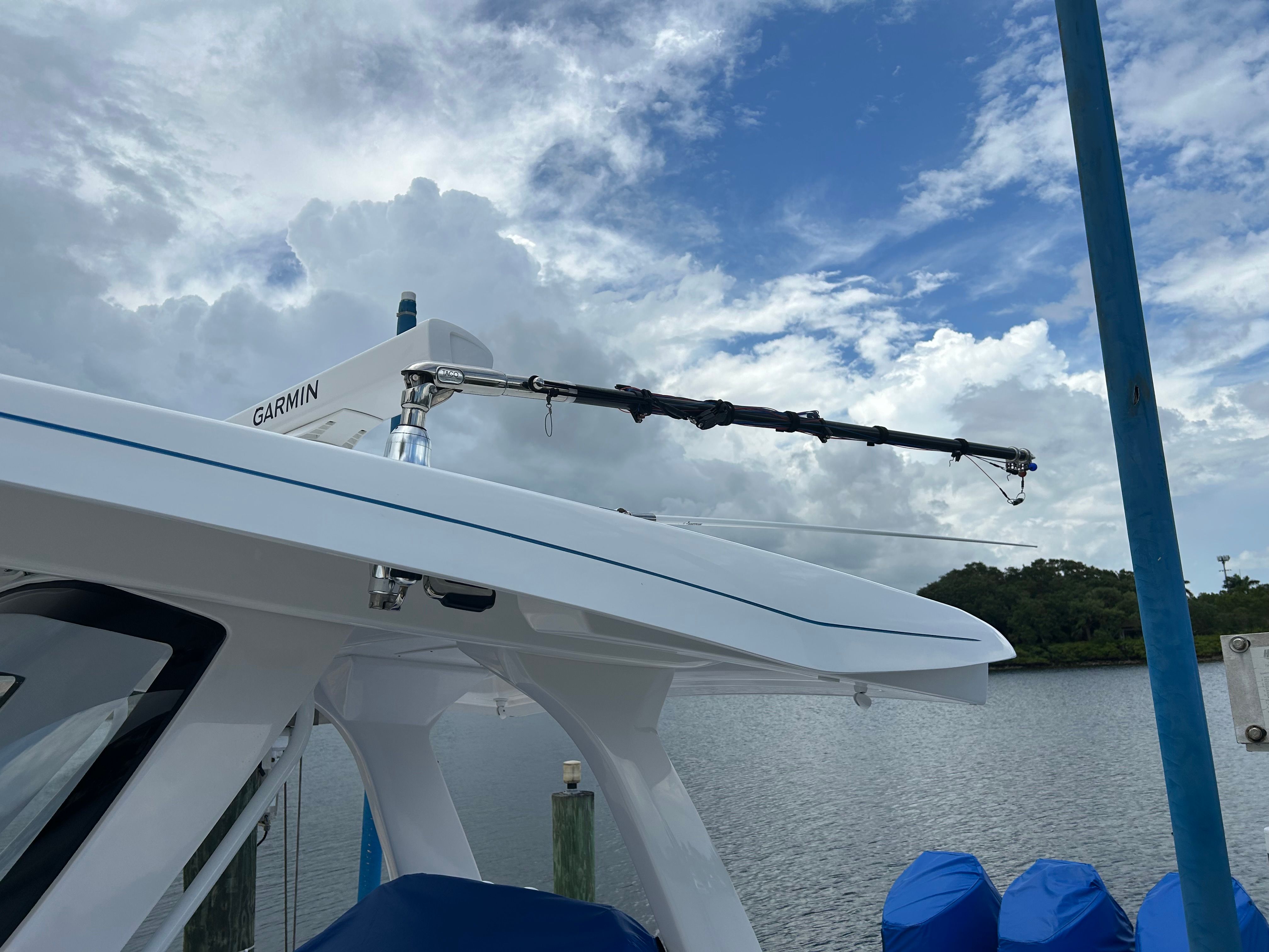 Intrepid 375 Nomad SE 2025 with Garmin equipment by the water.
