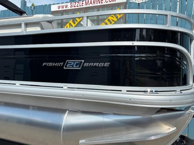 2026 Sun Tracker Fishin' Barge 20 DLX pontoon boat, side view, at Sizzle Marine.