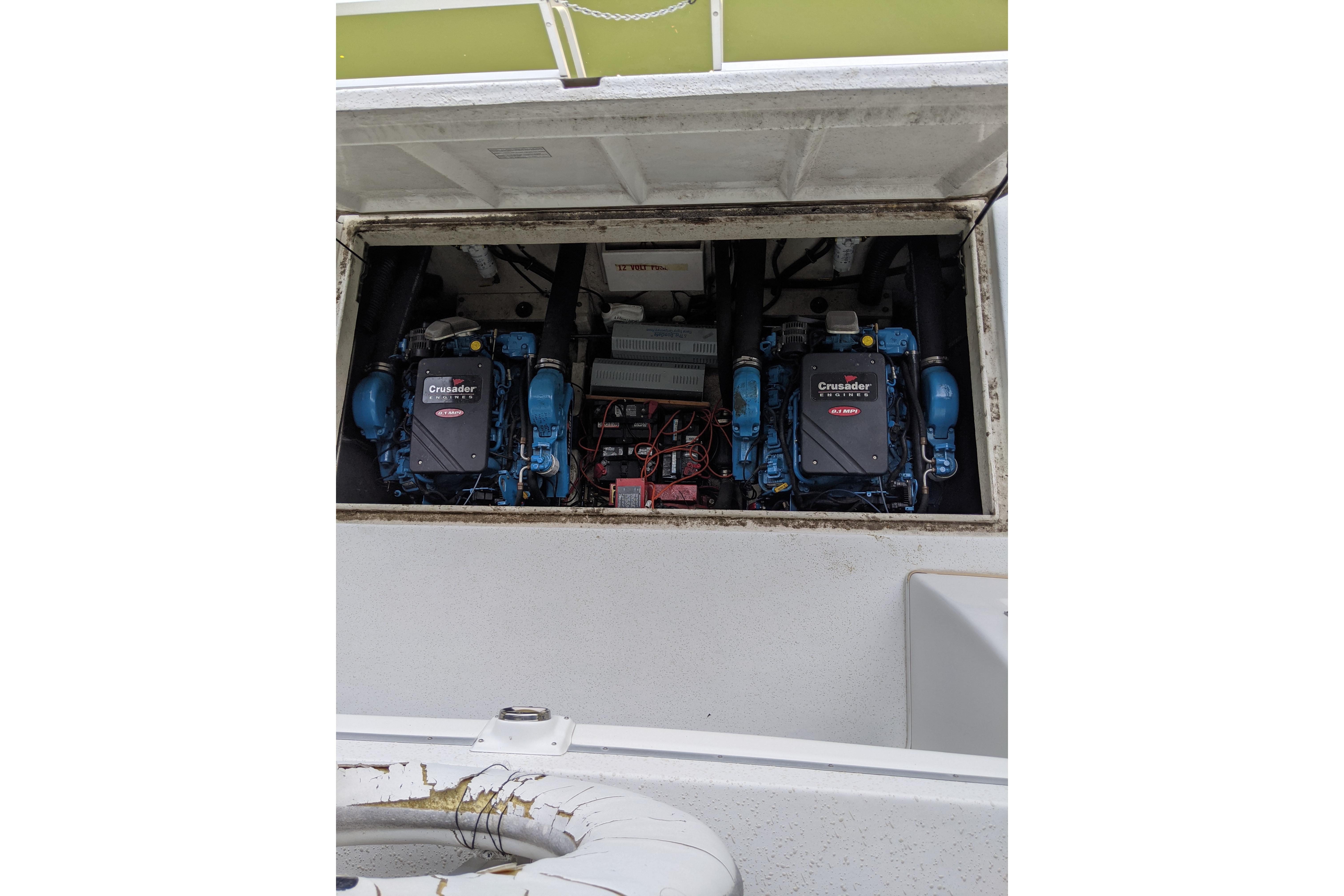 Engine compartment of a 2001 Gibson 50 Cabin Yacht with Crusader engines visible.