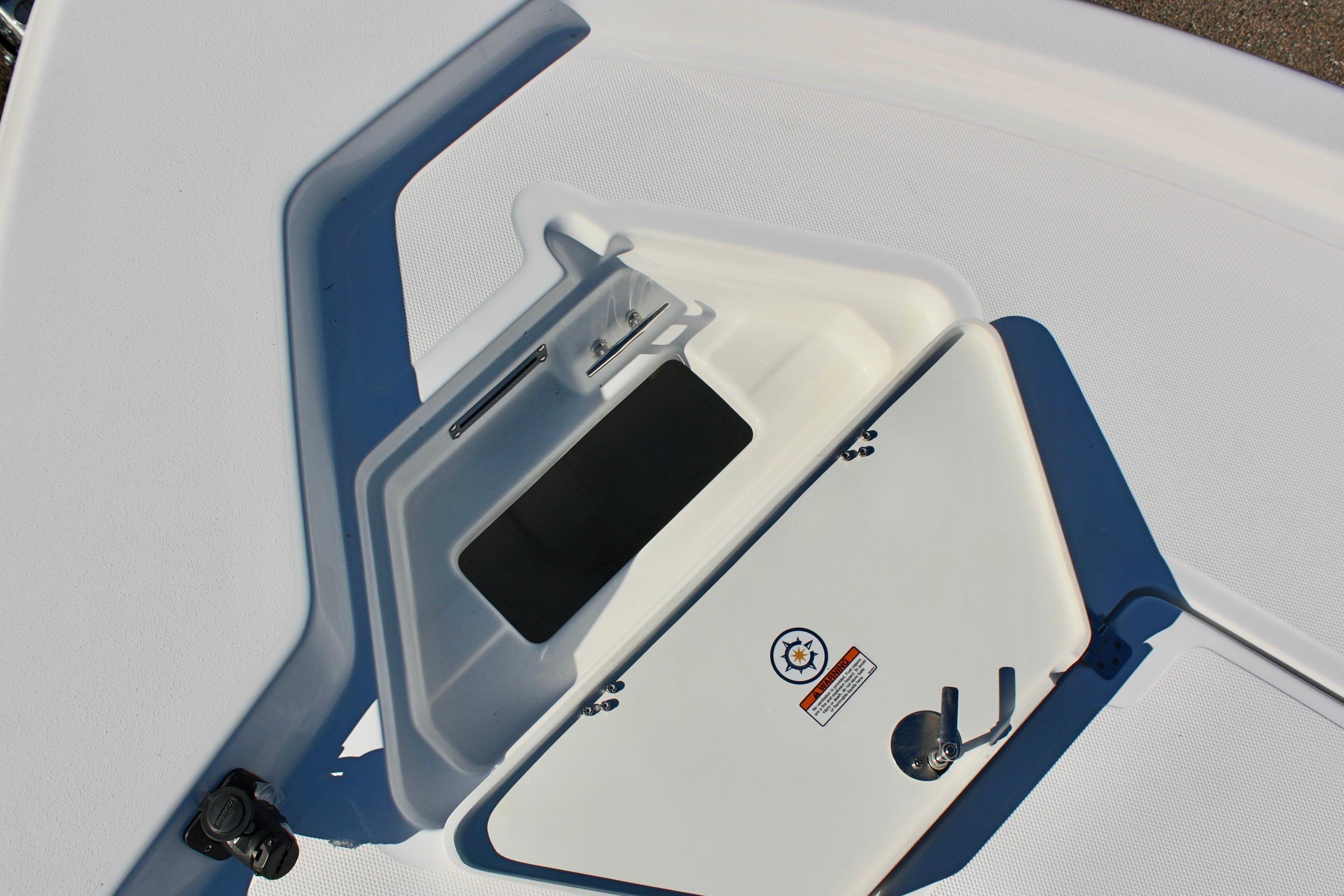 2025 NauticStar 214 Shallow Bay boat storage compartment detail.