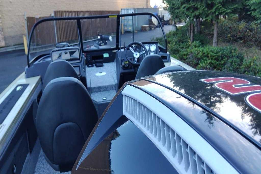2026 Tracker Targa V-19 Combo boat interior with steering wheel and seating.