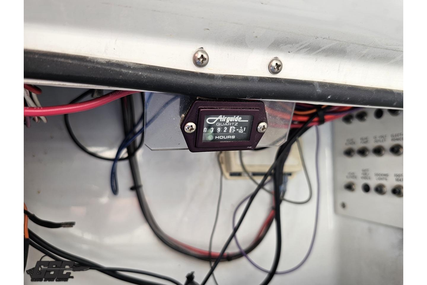 Hour meter display inside a 2002 Formula 382 FASTech boat, showing 928.1 hours.