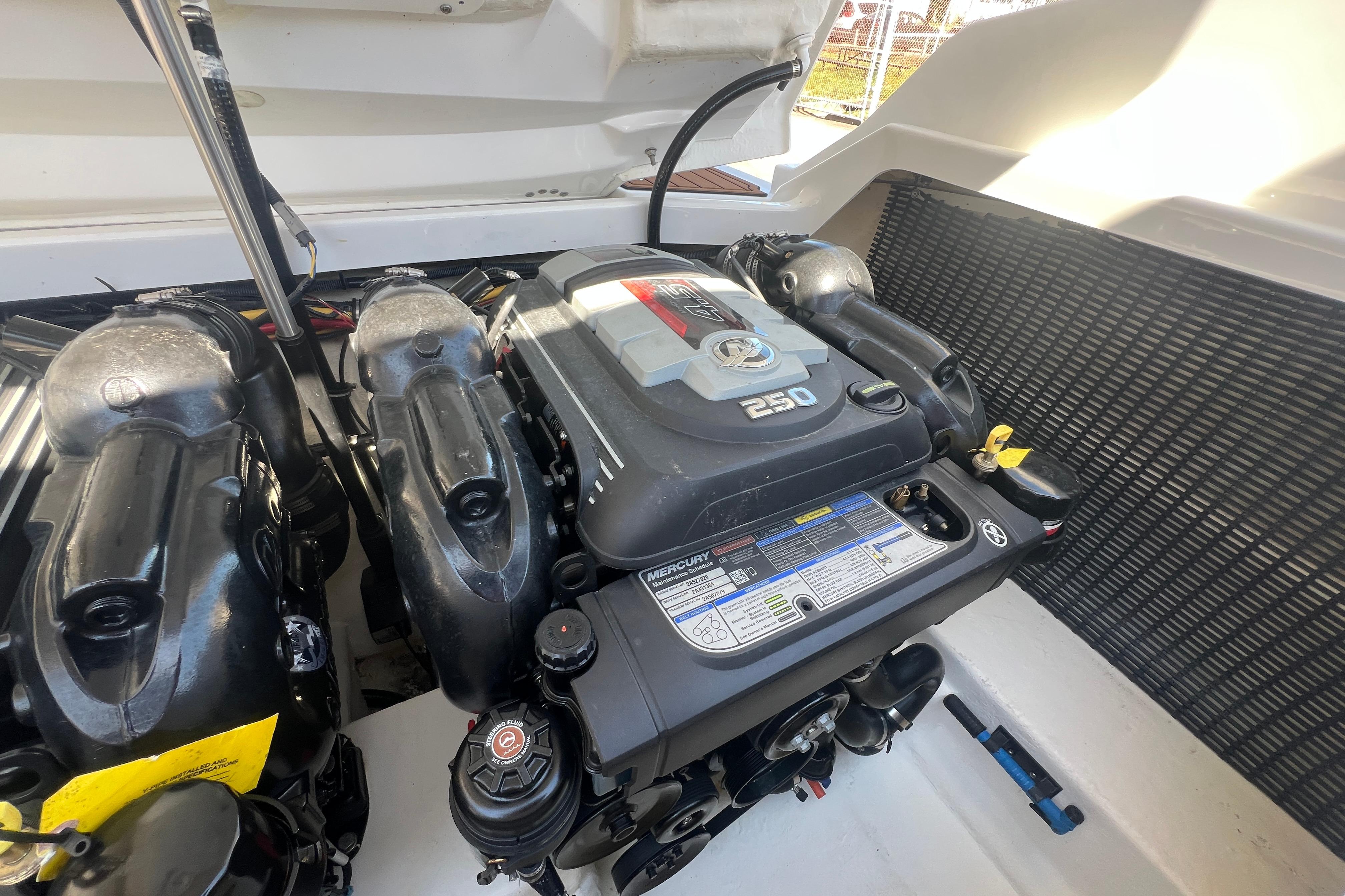 Engine compartment of a 2017 Monterey 298SS Super Sport boat, featuring a Mercury 250 engine.