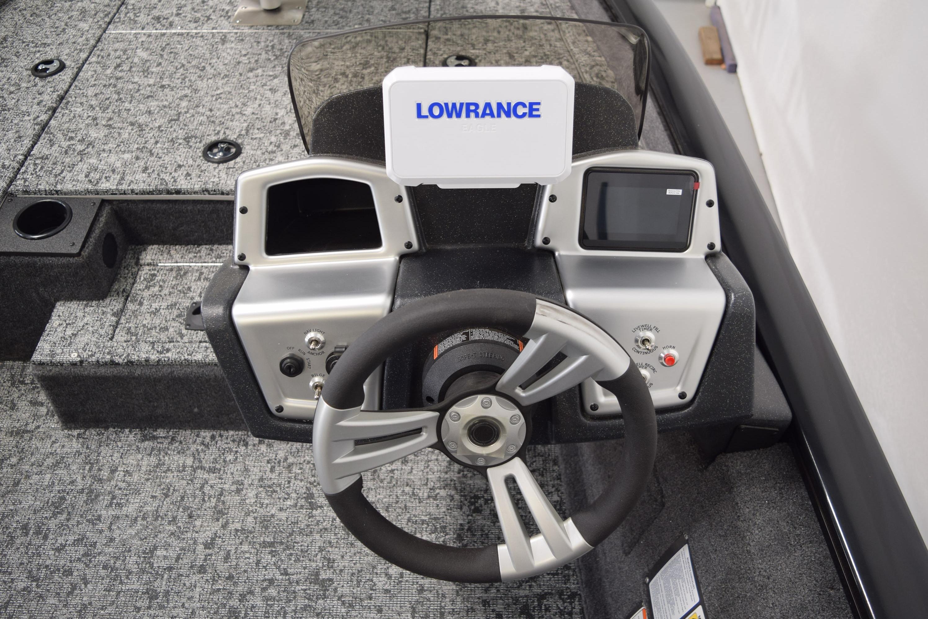 Steering console of 2026 Tracker Pro Team 175 boat with Lowrance electronics.