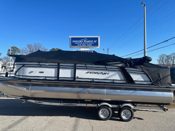 2024 Starcraft SLS3 pontoon boat with black cover at Angler's Marine NC.