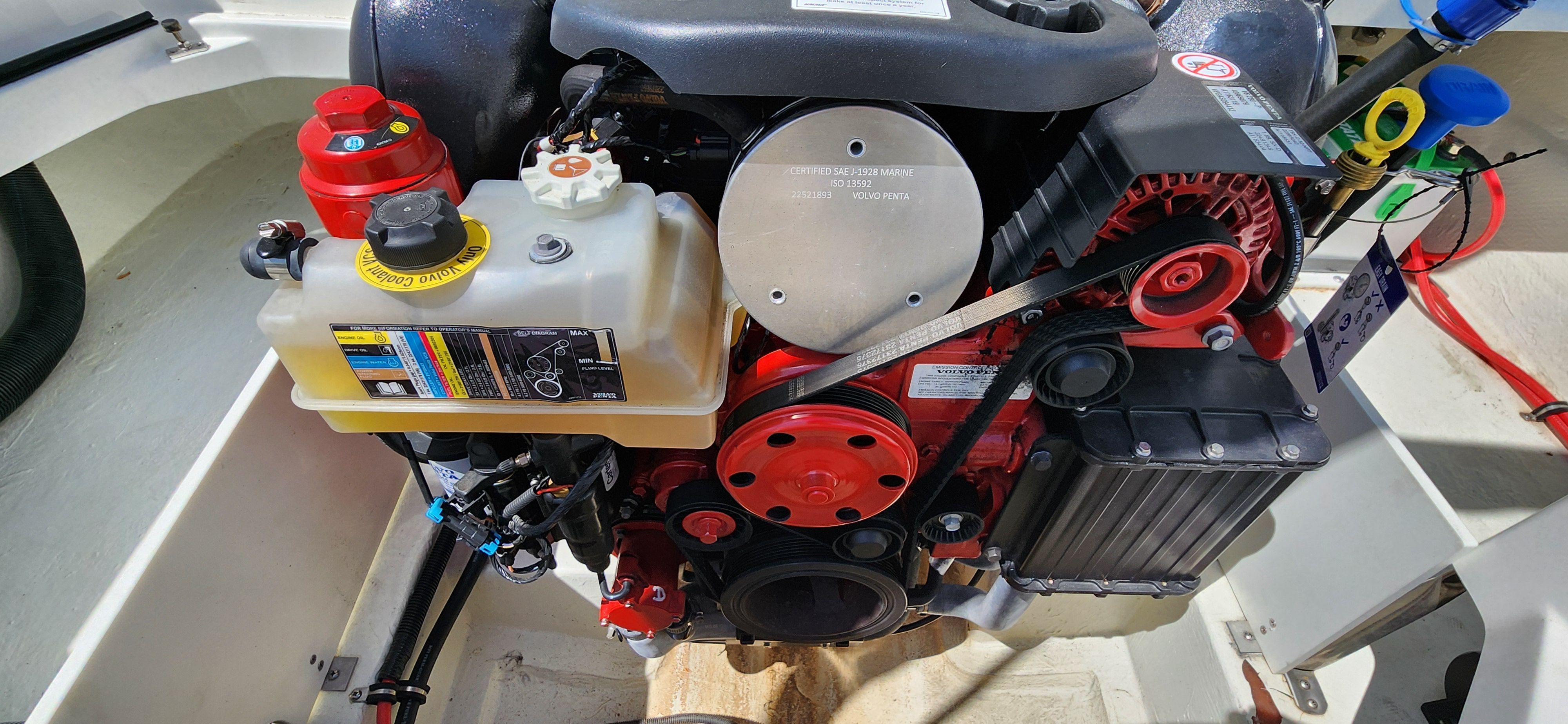 Engine of a Cobalt CS22 boat, clearly visible in the engine compartment.