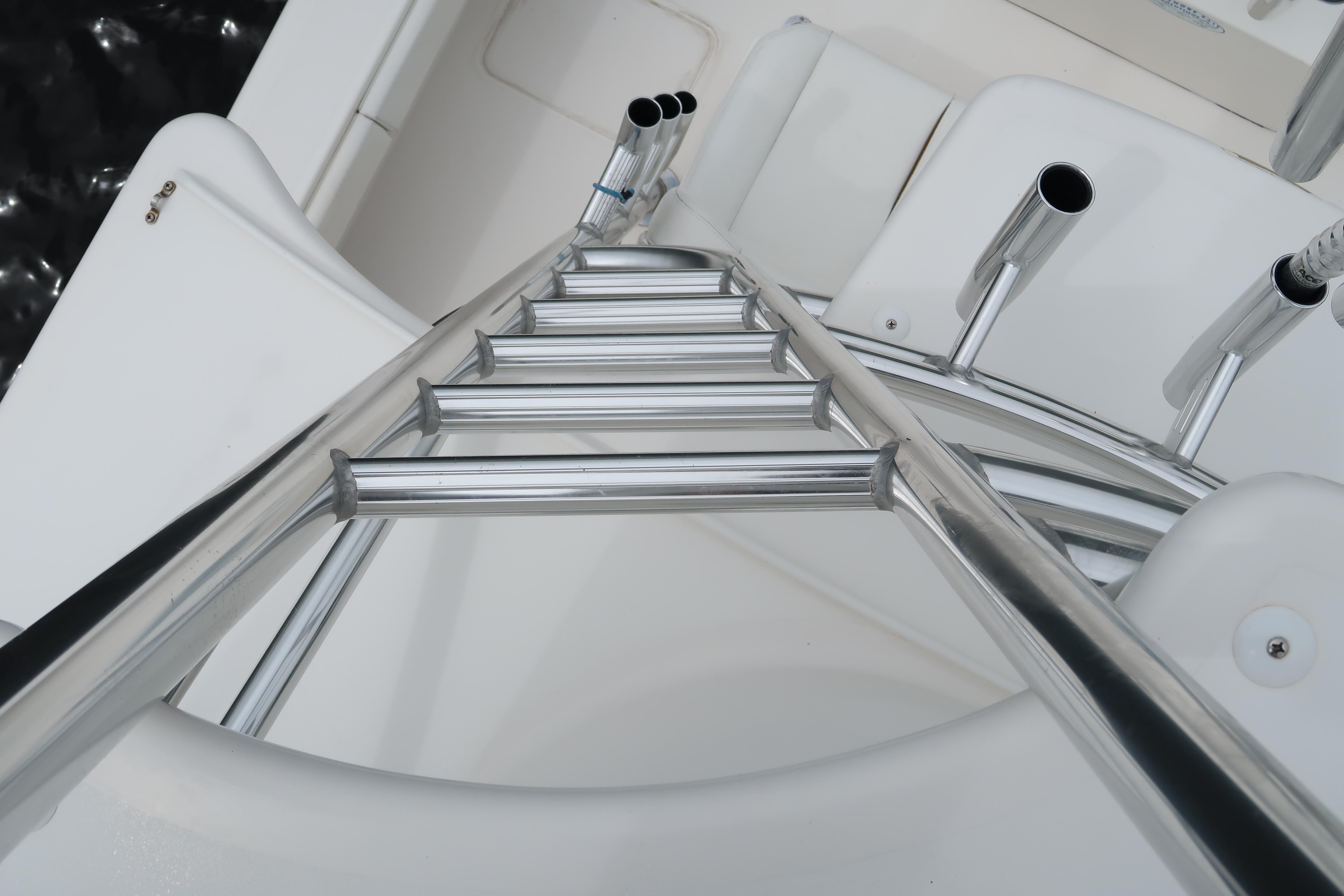 Ladder and rod holders on 2016 Invincible 42 Open Fisherman boat.