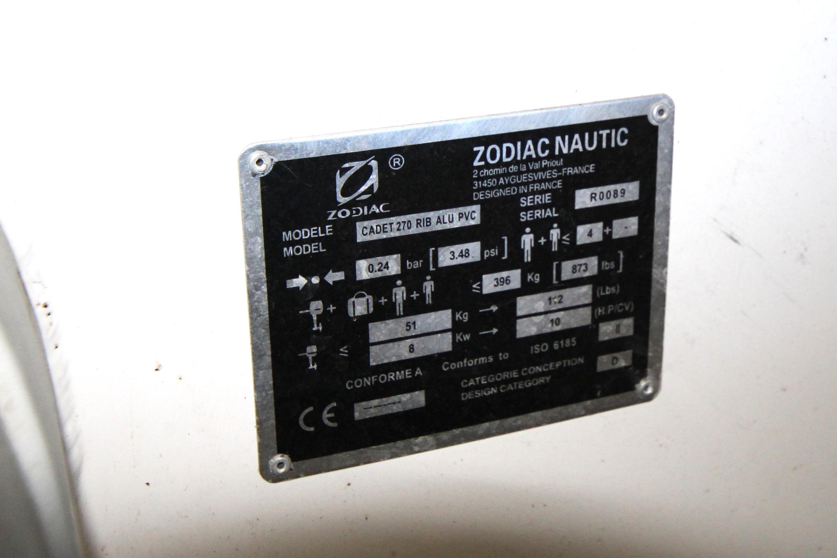 Zodiac Nautic model plate on Ranger Tugs R-31 CB, 2013, displaying specifications and serial number.